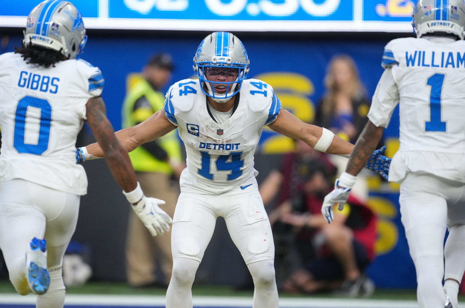 Detroit Lions running back Jahmyr Gibbs (0), Detroit Lions wide receiver Amon-Ra St. Brown (14) and Detroit Lions wide receiver Jameson Williams (1) celebrate after a touchdown during the second quarter against the Los Angeles Rams at SoFi Stadium.