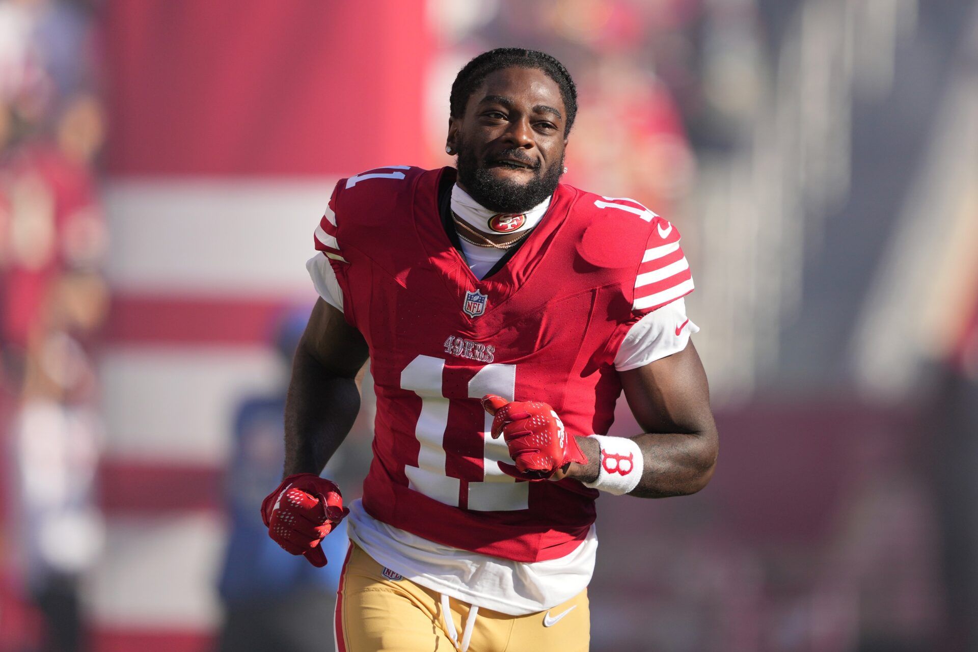 San Francisco 49ers wide receiver Brandon Aiyuk (11) is introduced to the crowd before the game against the New York Jets at Levi's Stadium.