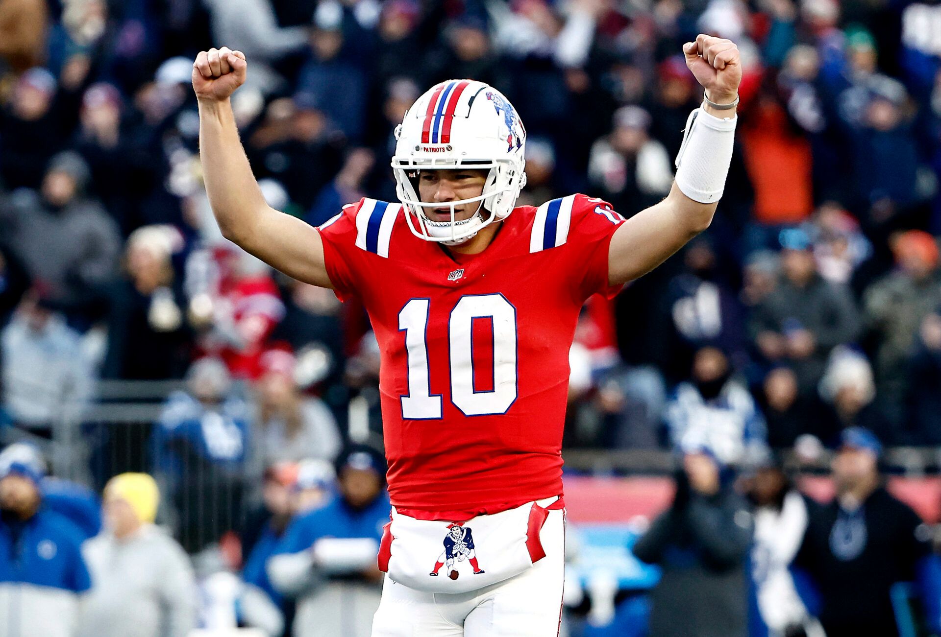 FOXBOROUGH, MASSACHUSETTS - DECEMBER 01: Drake Maye #10 of the New England Patriots reacts after a touchdown in the fourth quarter of a game against the Indianapolis Colts at Gillette Stadium on December 01, 2024 in Foxborough, Massachusetts. (Photo by Winslow Townson/Getty Images)