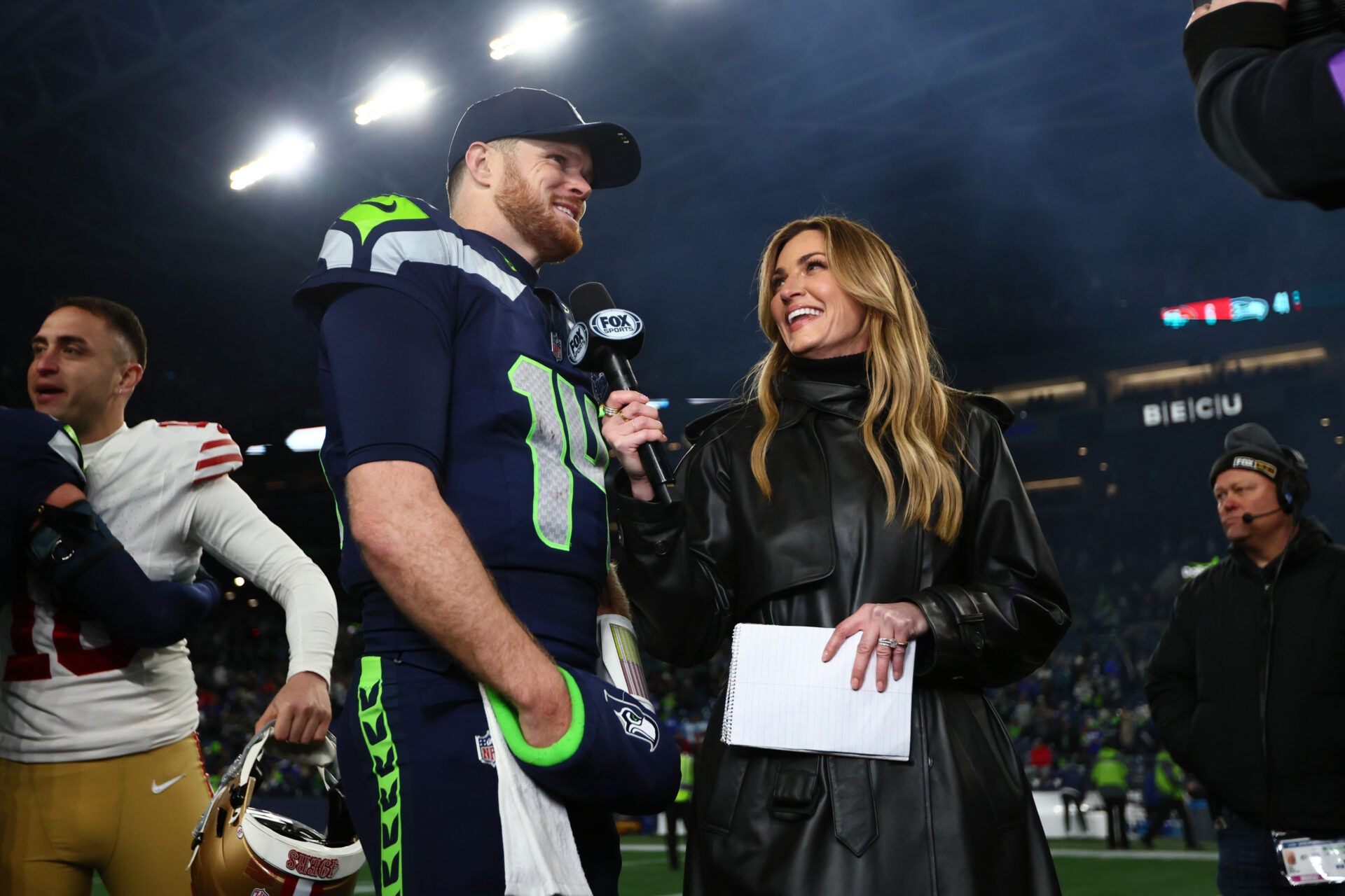 Seattle Seahawks quarterback Sam Darnold (14) is interview by Fox Sports Erin Andrews following an NFC Divisional Round game against the San Francisco 49ers at Lumen Field.