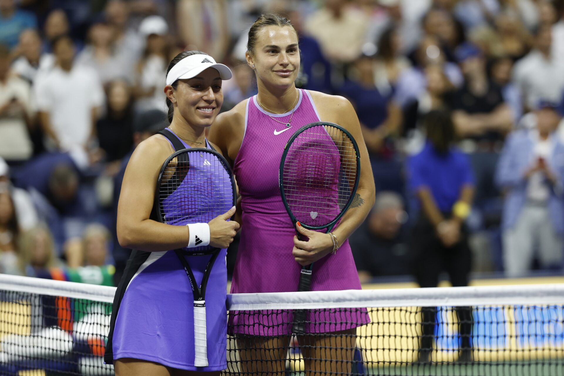 Jessica Pegula (USA)(L) and Aryna Sabalenka (R) pose for a picture prior to their women's singles final on day thirteen of the 2024 U.S. Open tennis tournament at USTA Billie Jean King National Tennis Center.