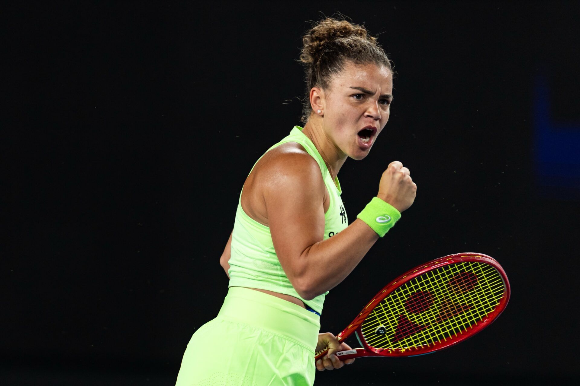 Jasmine Paolini of Italy in action against Magdalena Frech of Poland in the second round of the womens singles at the Australian Open at John Cain Arena in Melbourne Park.