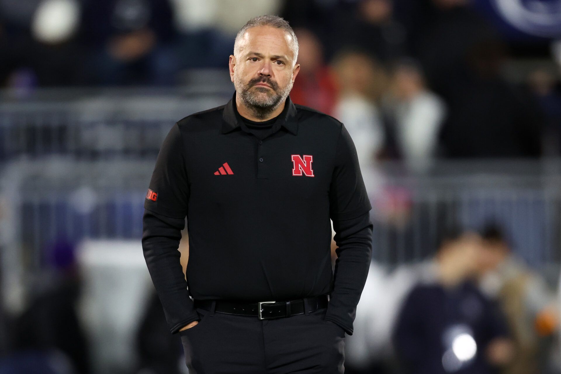 Nebraska Cornhuskers head coach Matt Rhule stands on the field during a warmup prior to the game against the Penn State Nittany Lions at Beaver Stadium.