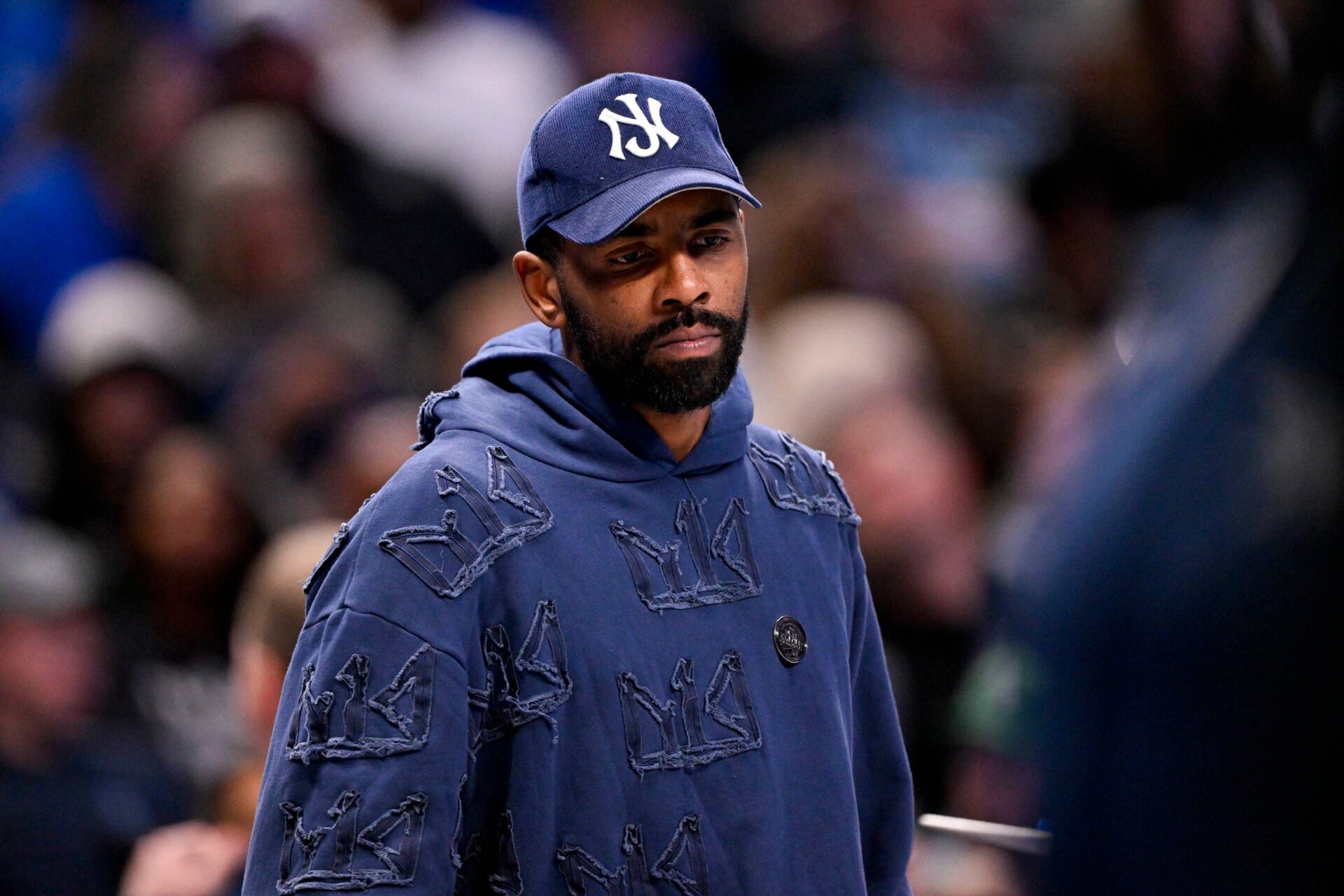 Dallas Mavericks guard Kyrie Irving (11) looks on during the second half against the Memphis Grizzlies at the American Airlines Center.