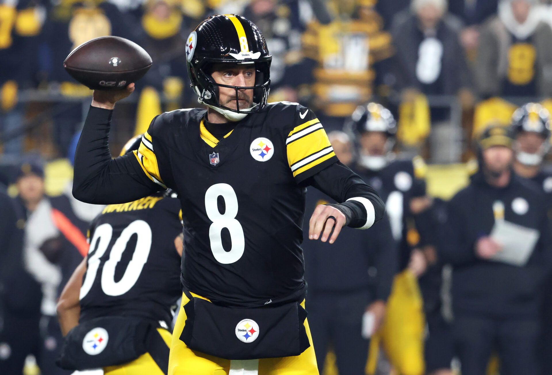 Pittsburgh Steelers quarterback Aaron Rodgers (8) throws during the first half of an AFC Wild Card Round game against the Houston Texans at Acrisure Stadium.