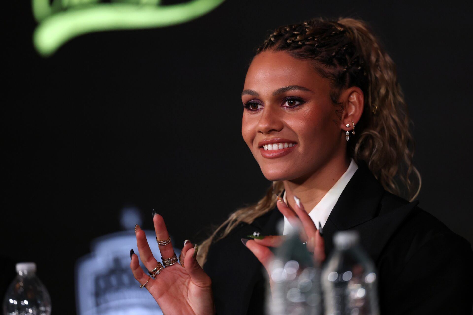 Trinity Rodman of the Washington Spirit answers questions during a press conference at BMO Stadium.
