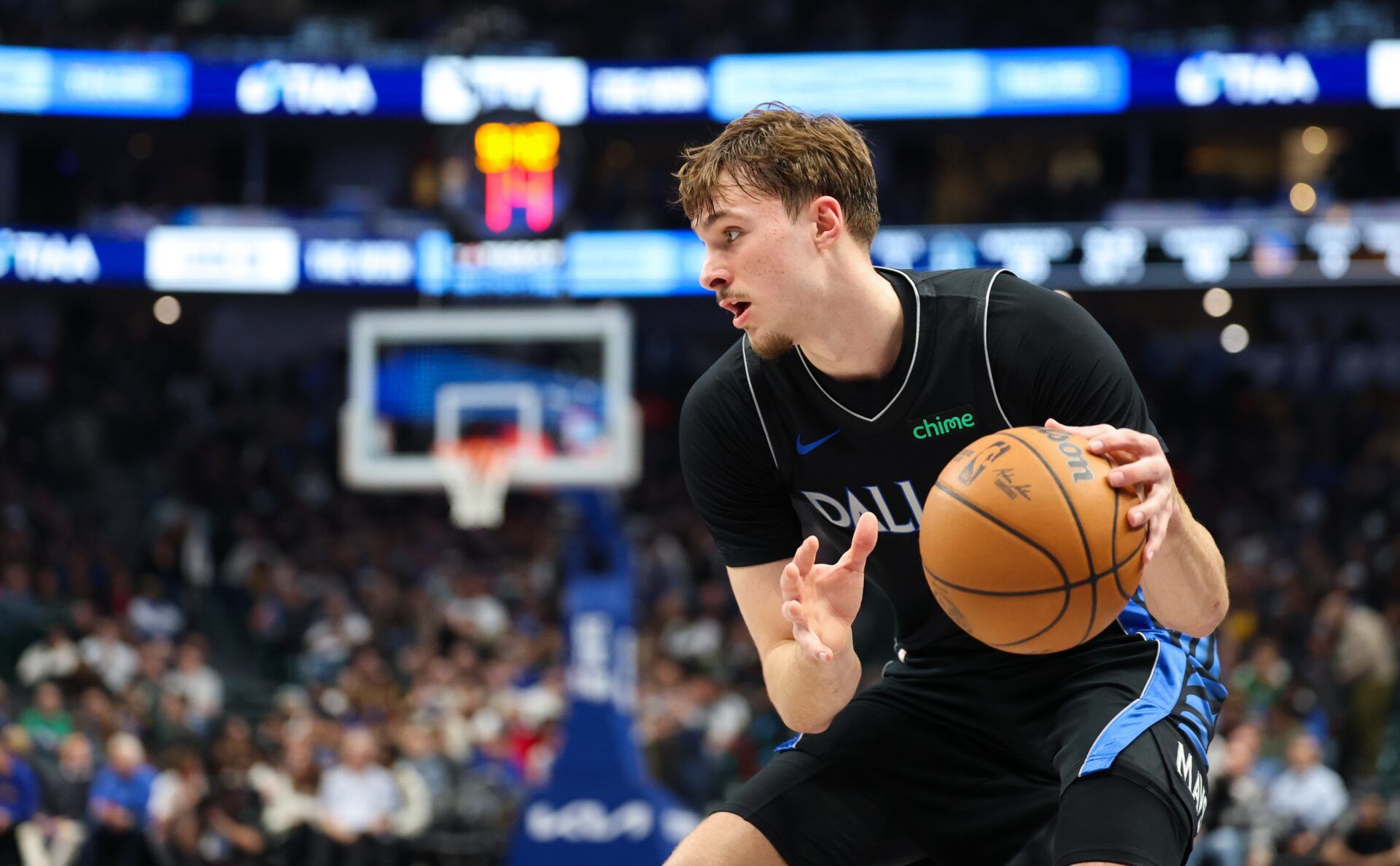 Dallas Mavericks forward Cooper Flagg (32) controls the ball against the Golden State Warriors during the second half at American Airlines Center.