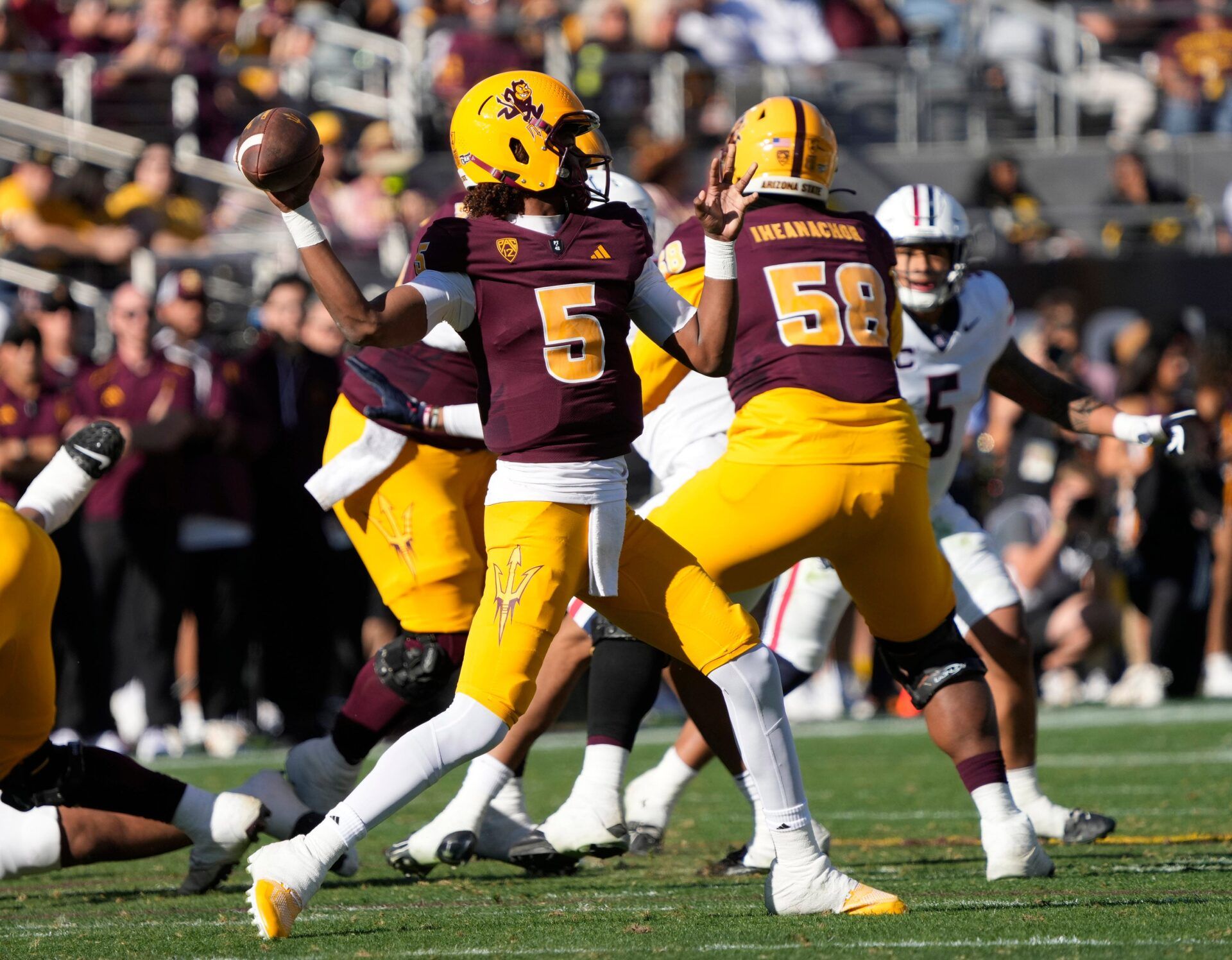 Arizona State quarterback Jaden Rashada (5) throws a pass against Arizona during the second quarter at Mountain America Stadium.