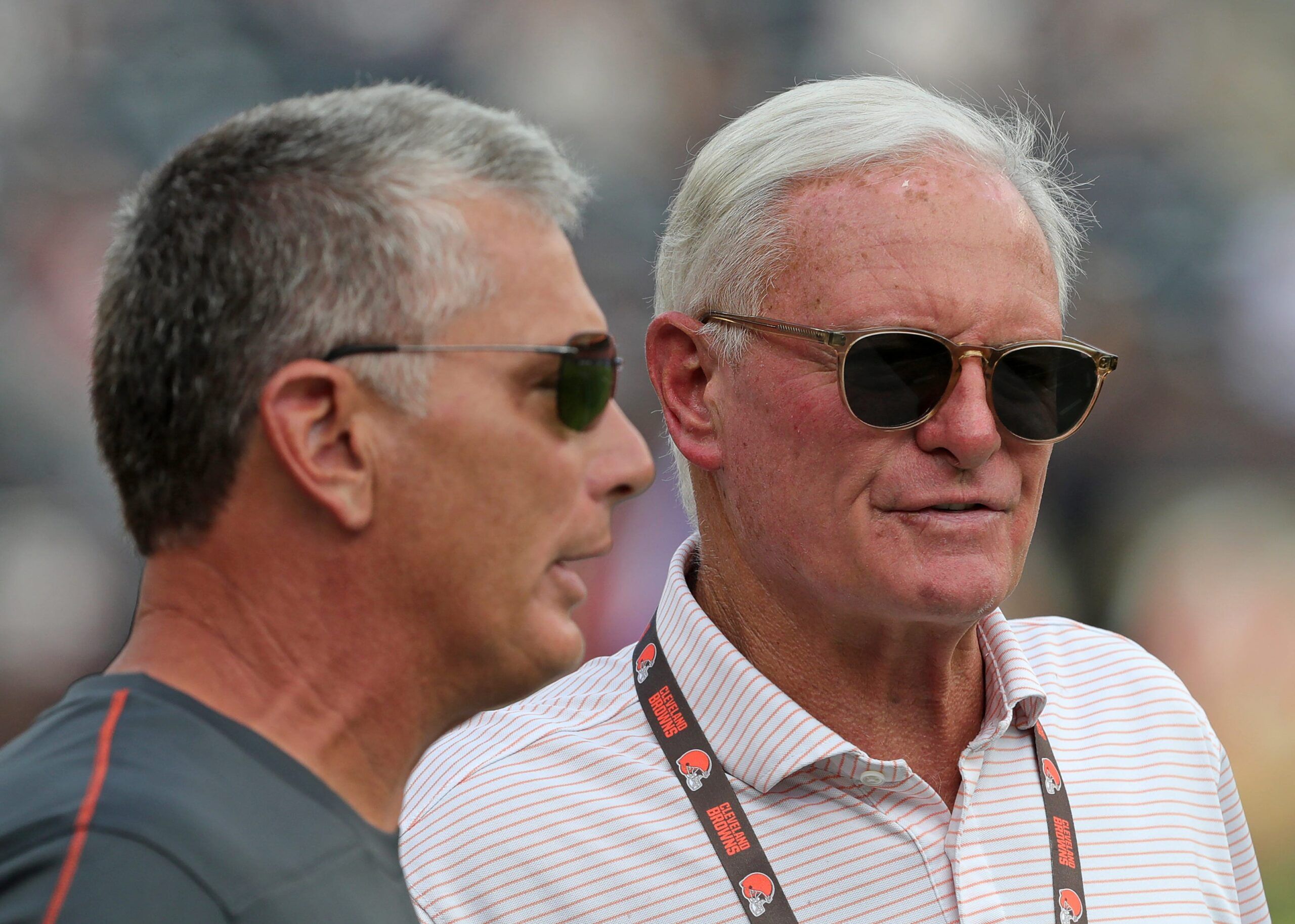 Cleveland Browns co-owner Jimmy Haslam, right, chats with defensive coordinator Jim Schwartz before an NFL preseason football game at Cleveland Browns Stadium, Saturday, Aug. 17, 2024, in Cleveland, Ohio.