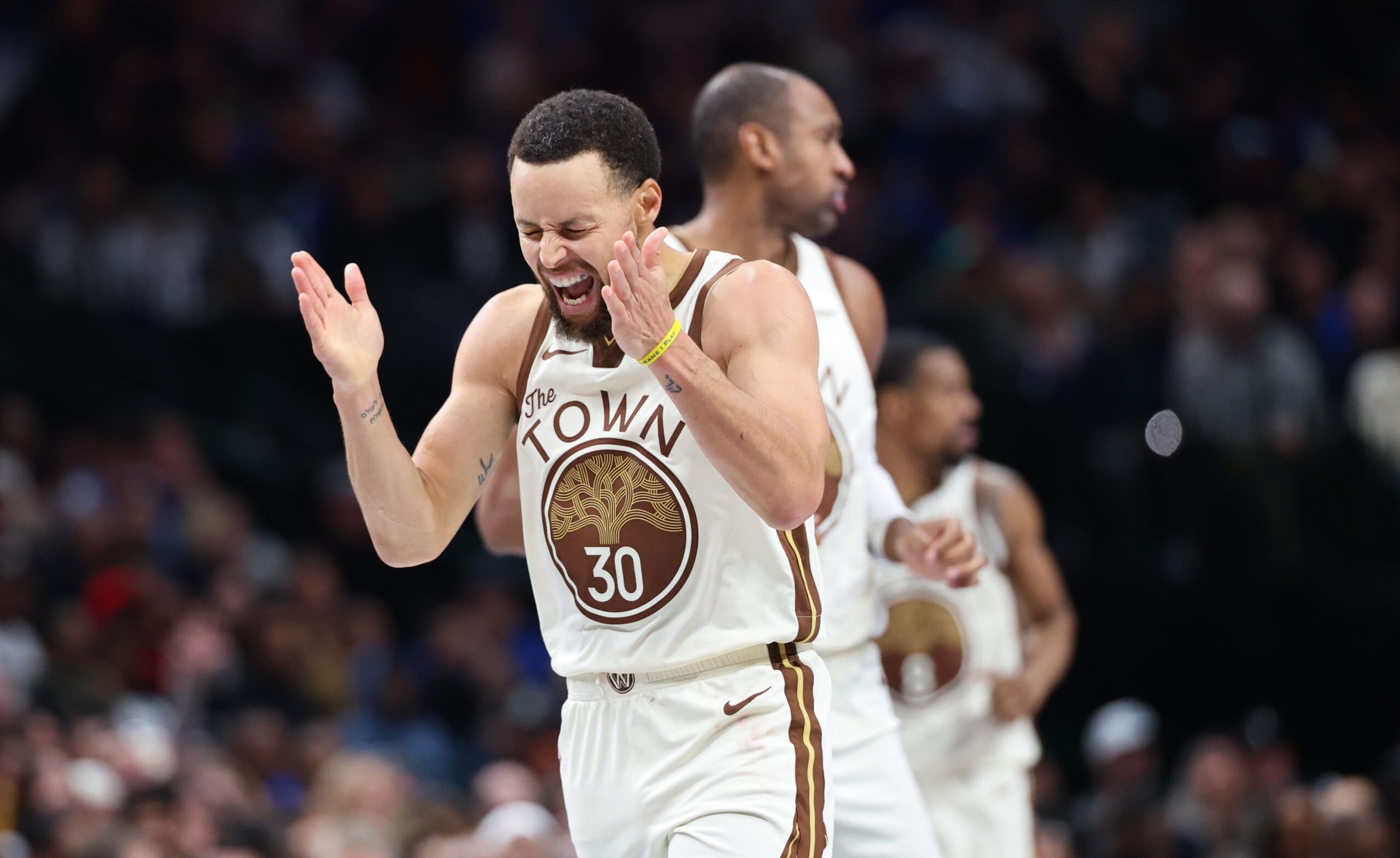 Golden State Warriors guard Stephen Curry (30) reacts during the second half against the Golden State Warriors at American Airlines Center.