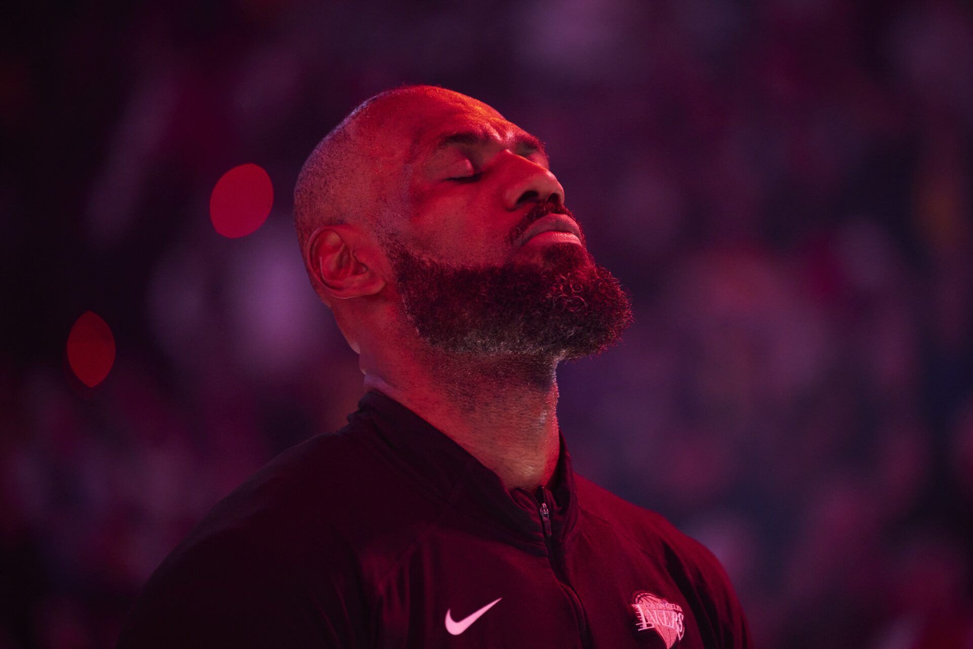 Los Angeles Lakers forward LeBron James (23) stands during the singing of the national anthem before a game against the Portland Trail Blazers at Moda Center.