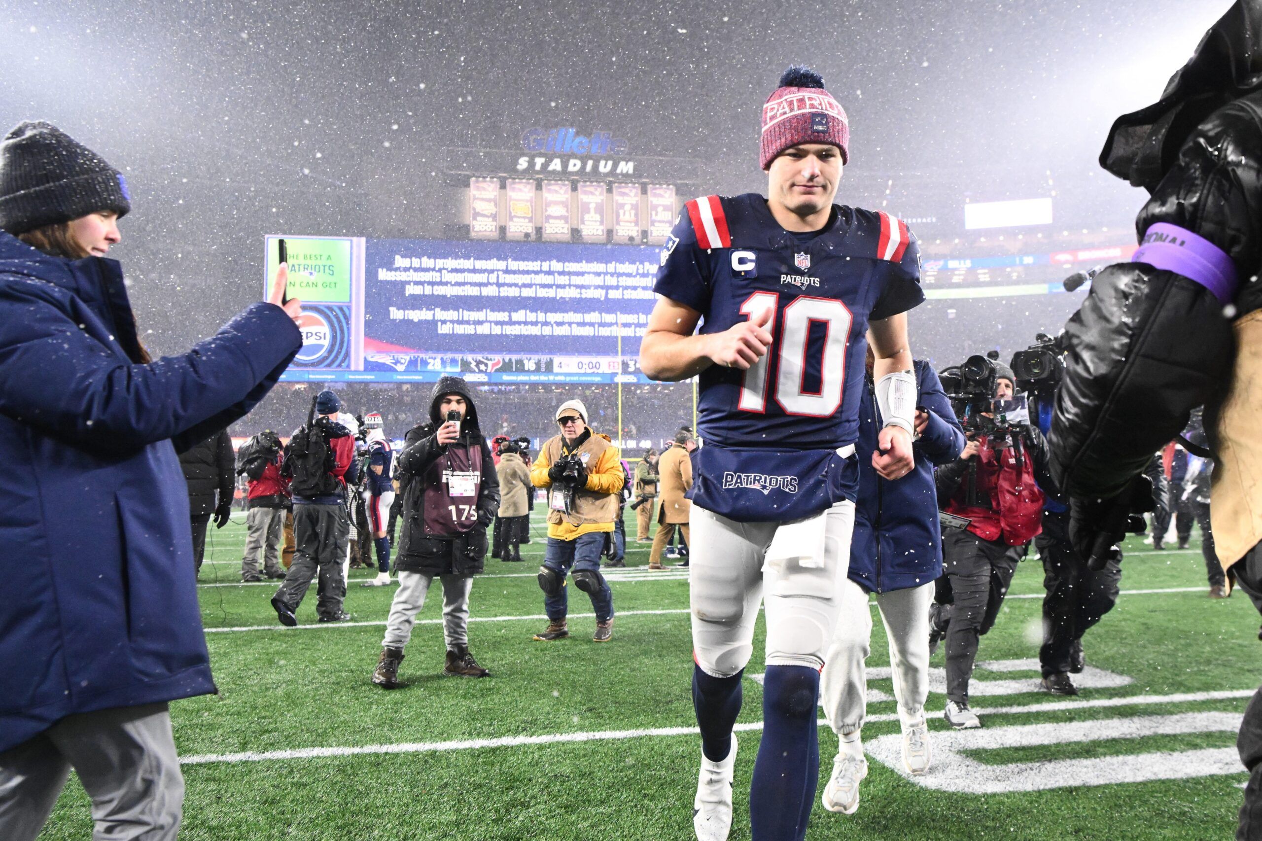 New England Patriots quarterback Drake Maye (10) leaves the field after defeating the Houston Texans in an AFC Divisional Round game at Gillette Stadium.