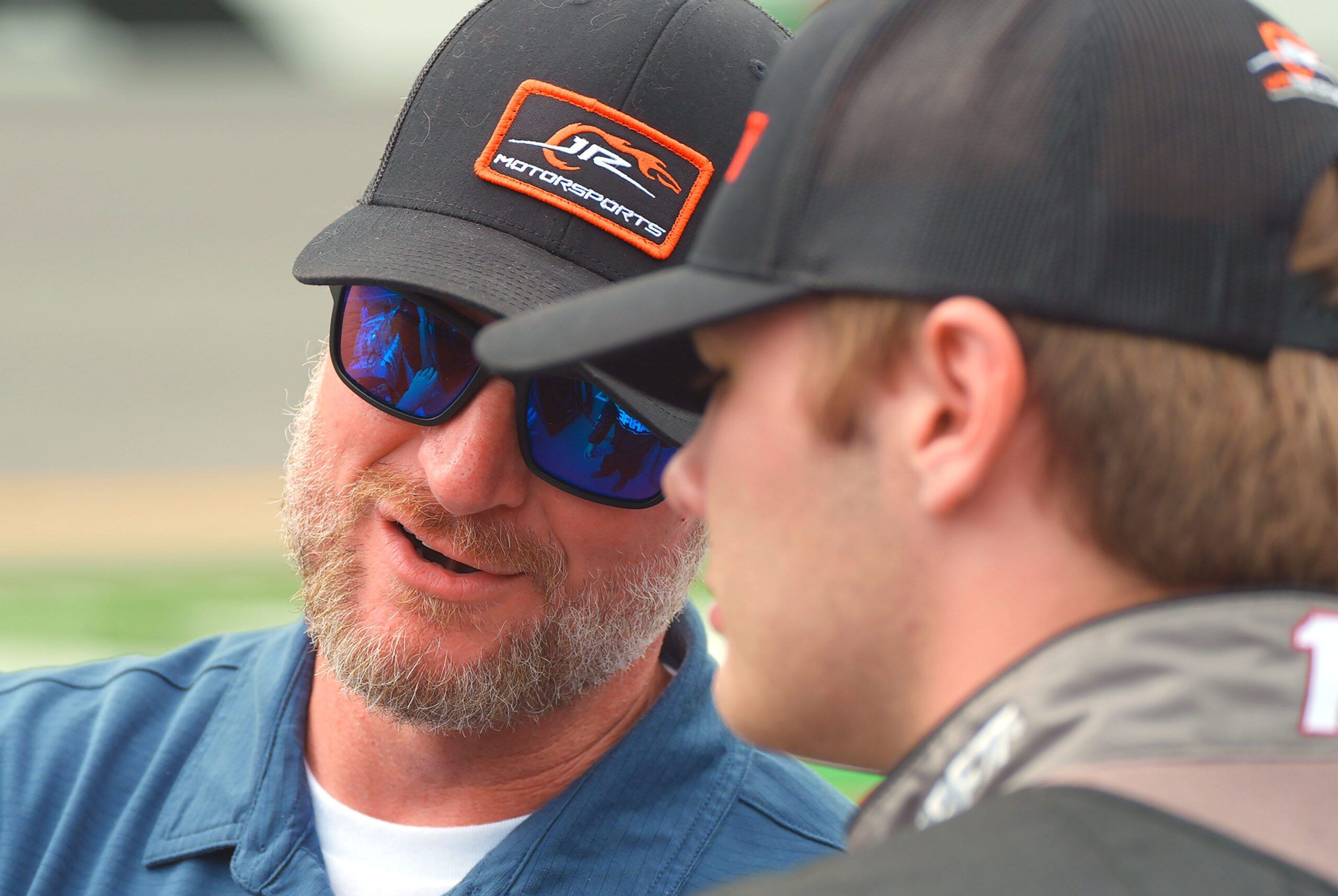 Dale Earnhardt Jr. talks with his driver Carson Kvapil, Friday August 22, 2025 in pit road during Xfinity qualifying .