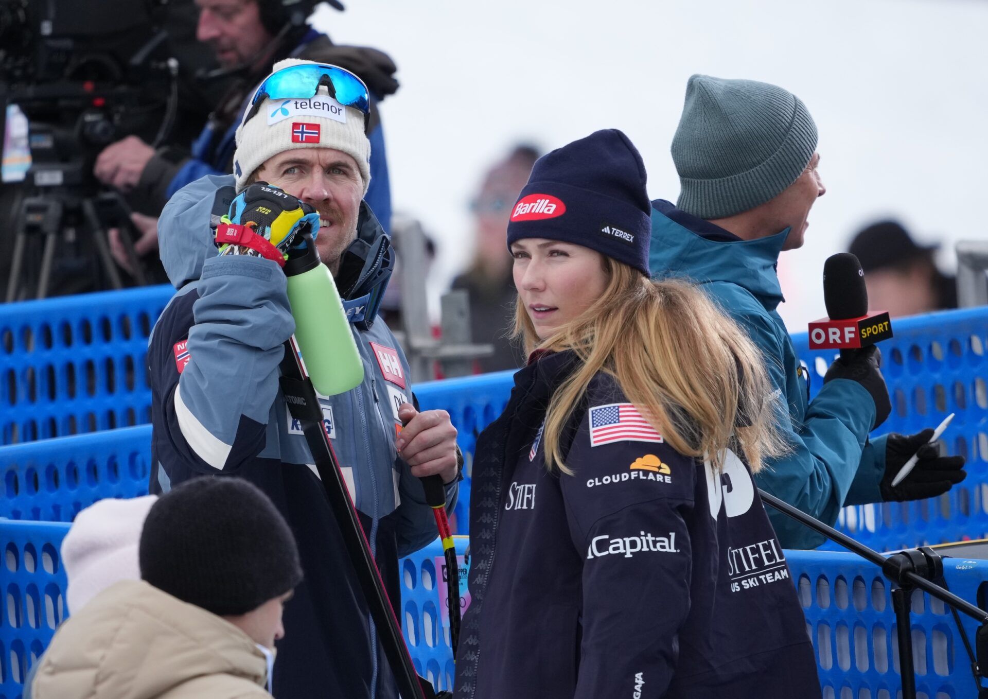 Aleksander Aamodt Kilde of Norway with Mikaela Shiffrin in the finish area after the men's Super G alpine skiing race at the Stifel Copper Cup at Copper Mountain.