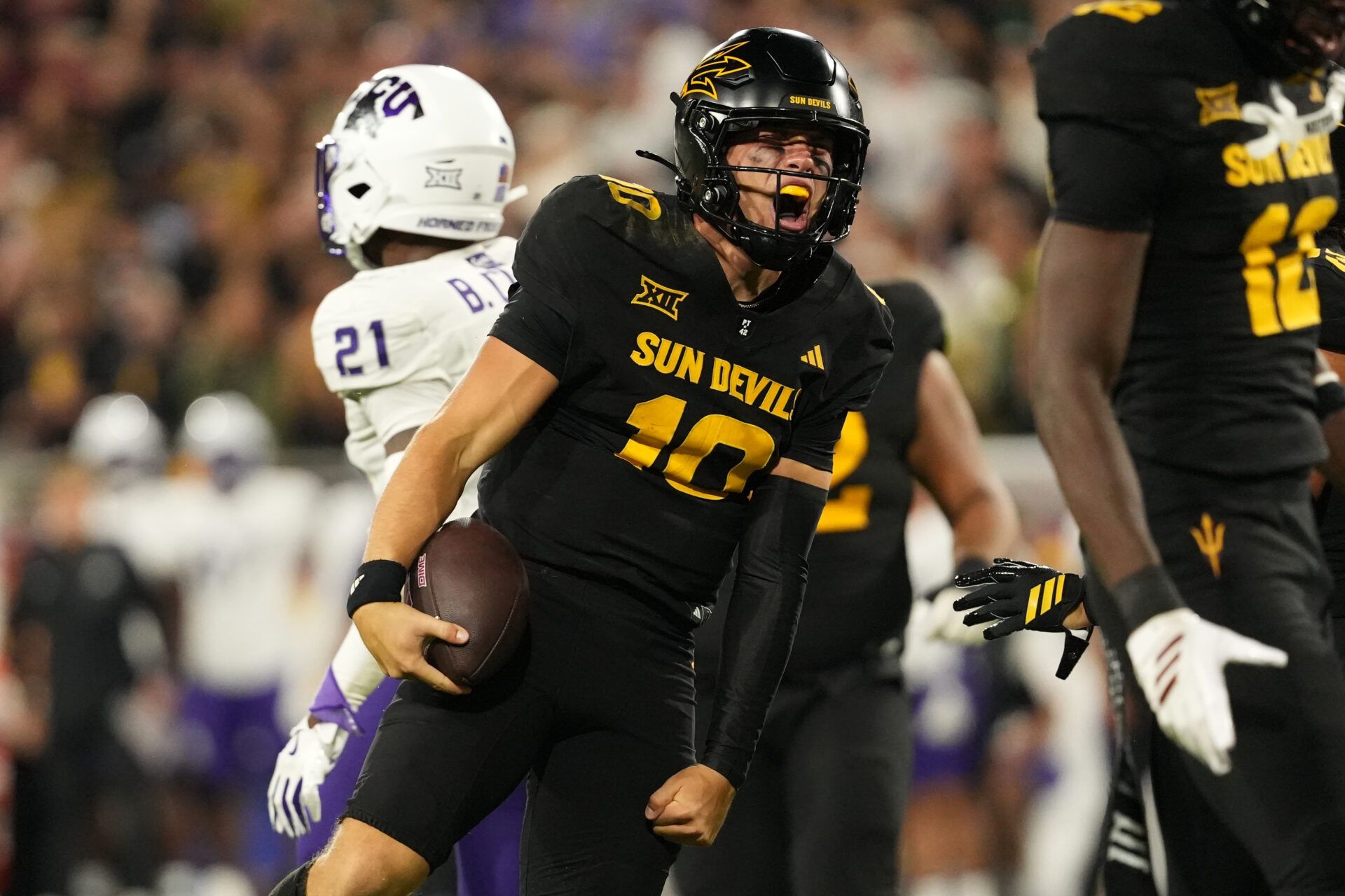 Arizona State Sun Devils quarterback Sam Leavitt (10) reacts after run against TCU Horned Frogs in the first half at Mountain America Stadium, Home of the ASU Sun Devils.
