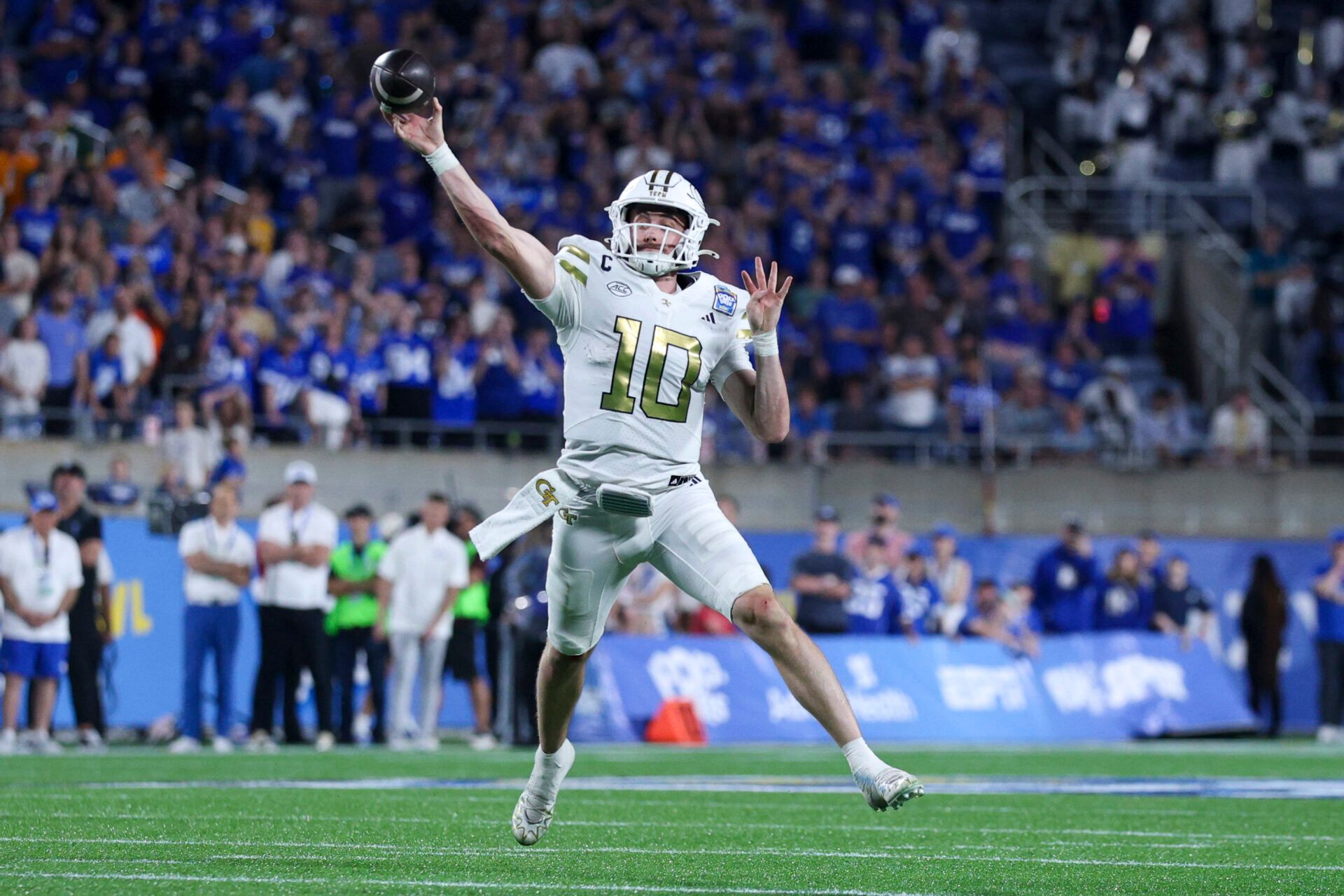 Georgia Tech Yellow Jackets quarterback Haynes King (10) throws a pass against the BYU Cougars in the fourth quarter during the Pop-Tarts Bowl at Camping World Stadium.
