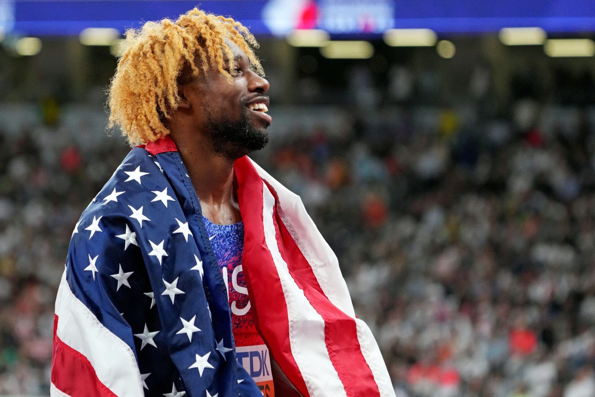 Noah Lyles (USA) celebrates winning the gold medal in the mens 200m during the World Athletics Championships at National Stadium.