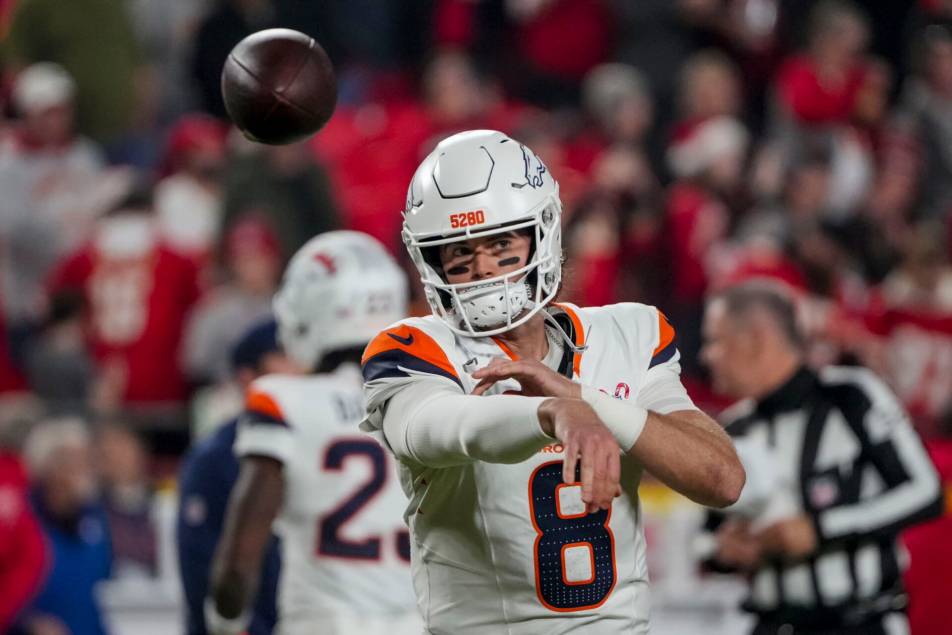 Denver Broncos quarterback Jarrett Stidham (8) warms up before the game at GEHA Field at Arrowhead Stadium.