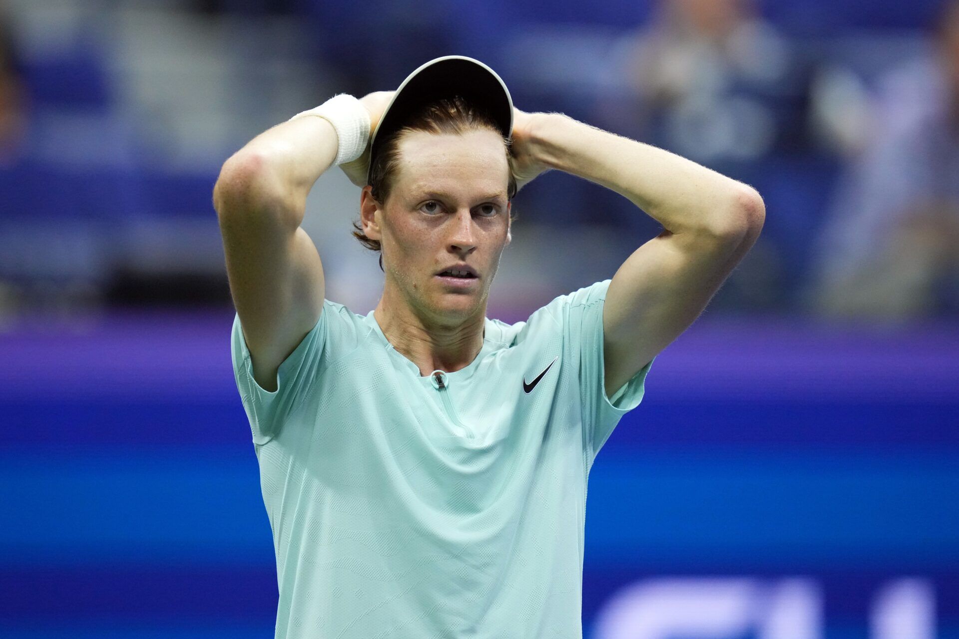 Jannik Sinner of Italy reacts to an error against Alexander Zverev of Germany on day eight of the 2023 U.S. Open tennis tournament at USTA Billie Jean King National Tennis Center.