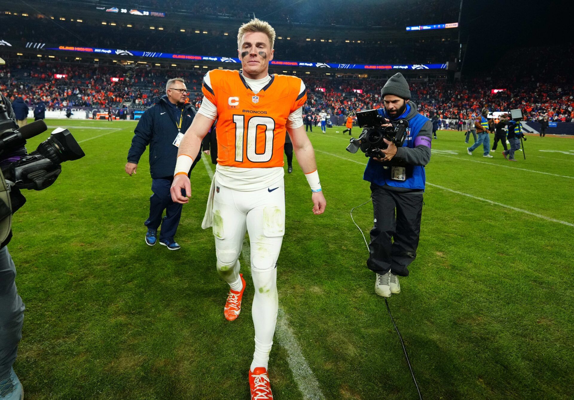 Denver Broncos quarterback Bo Nix (10) reacts after winning an AFC Divisional Round playoff game against the Buffalo Bills at Empower Field at Mile High.