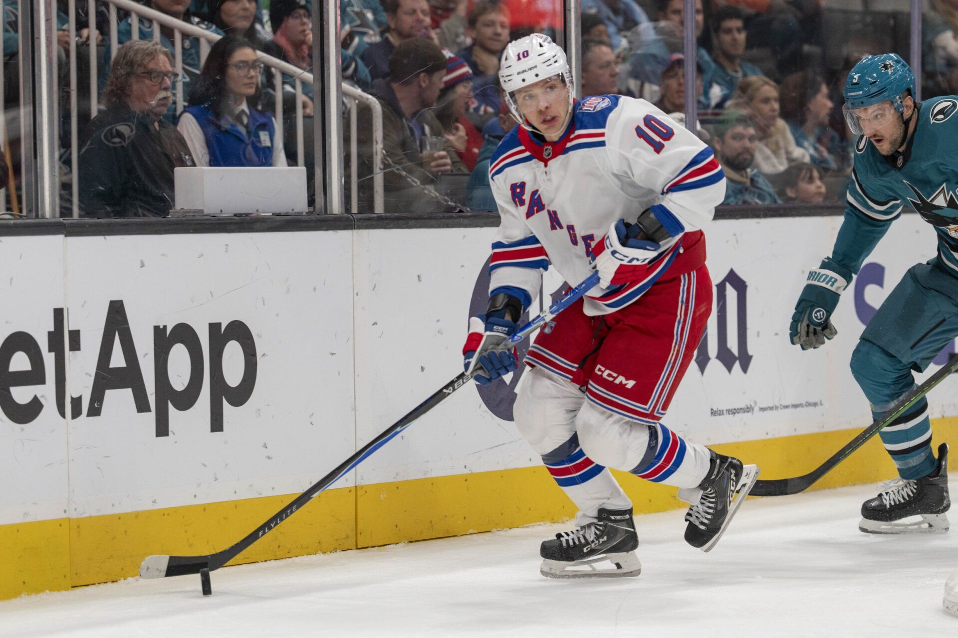 New York Rangers left wing Artemi Panarin (10) looks to pass the puck during the third period against the San Jose Sharks at SAP Center at San Jose.