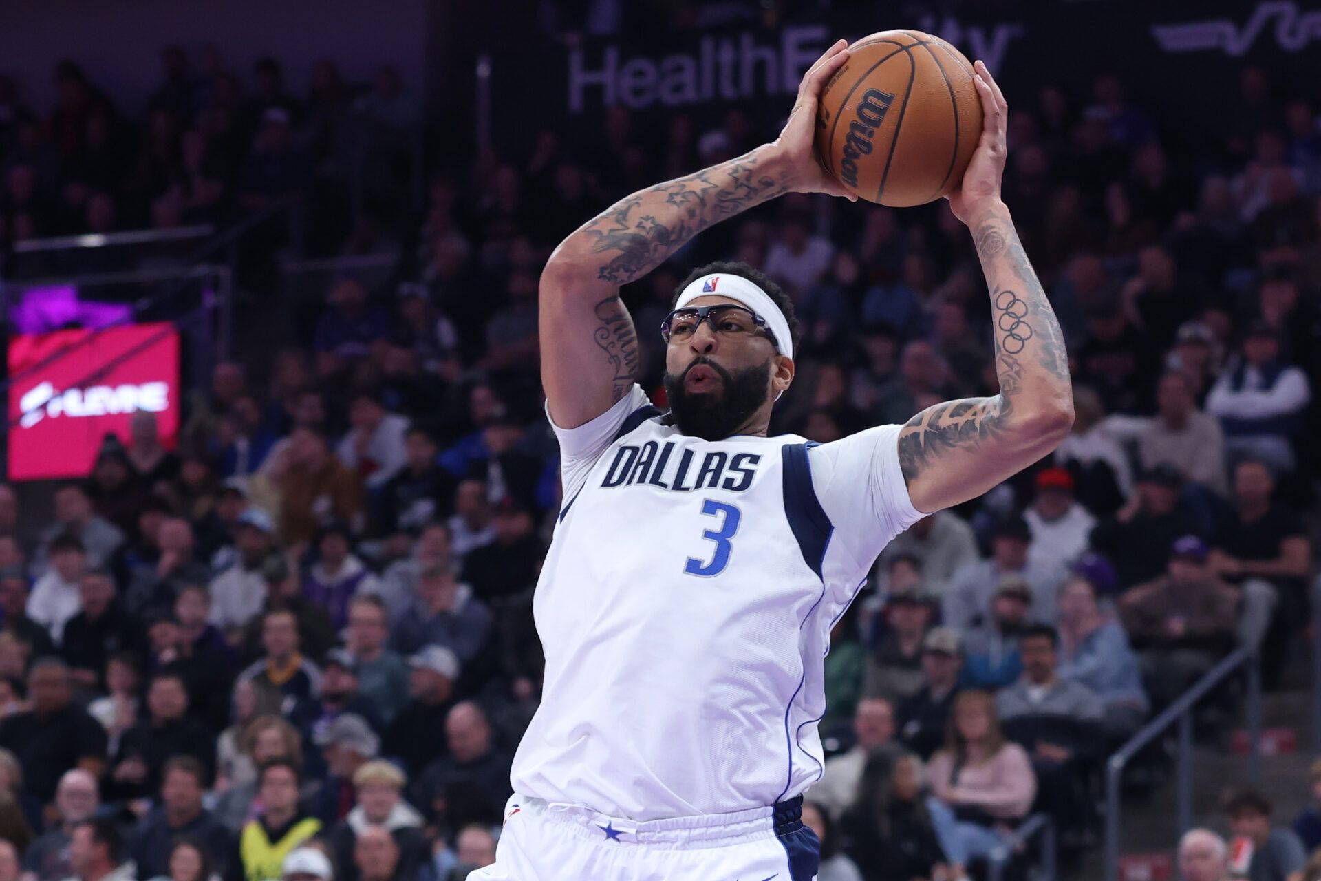 Dallas Mavericks forward Anthony Davis (3) looks to pass against the Utah Jazz during the first half at Delta Center.