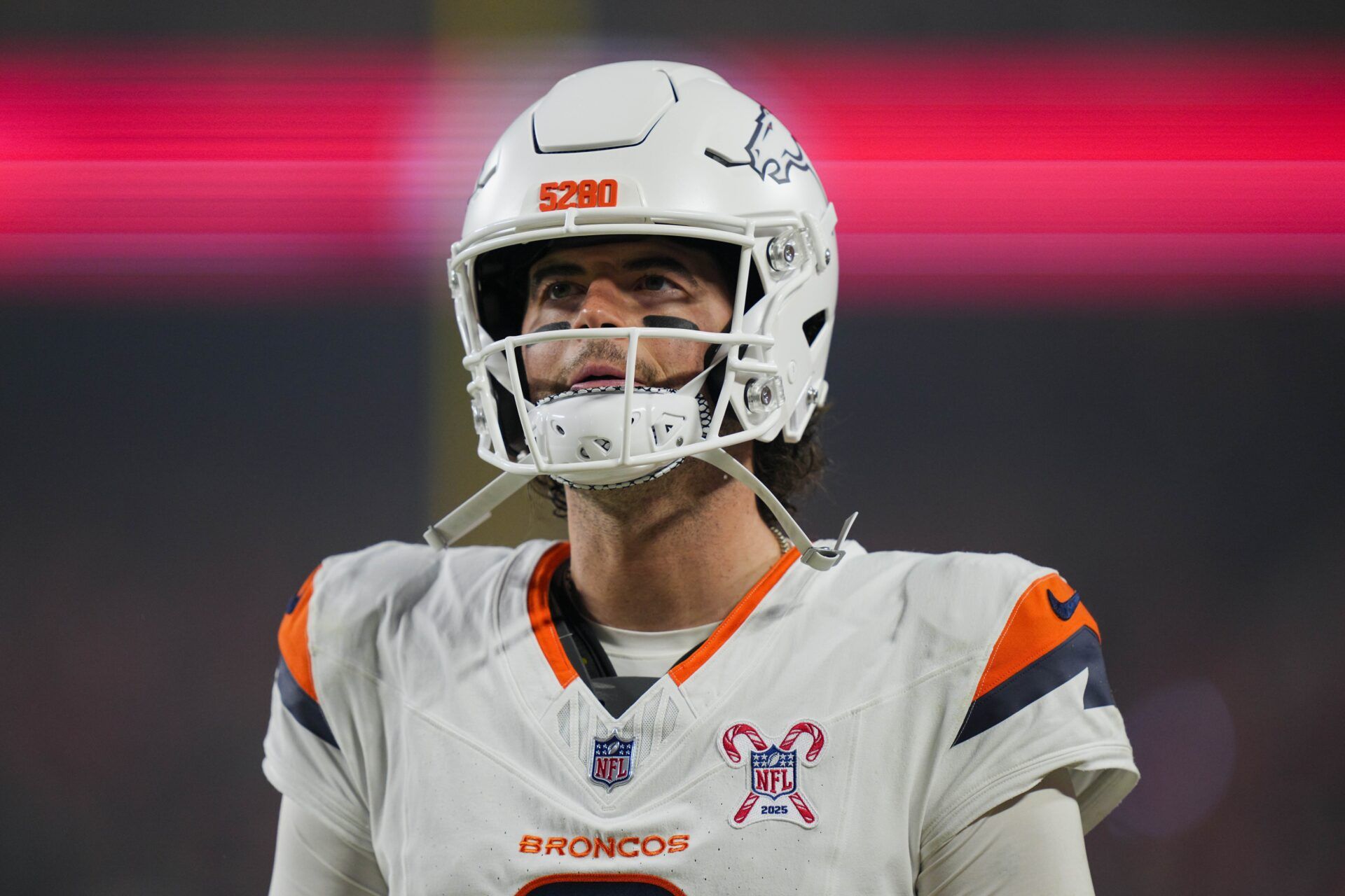 Denver Broncos quarterback Jarrett Stidham (8) prior to a game against the Kansas City Chiefs at GEHA Field at Arrowhead Stadium.