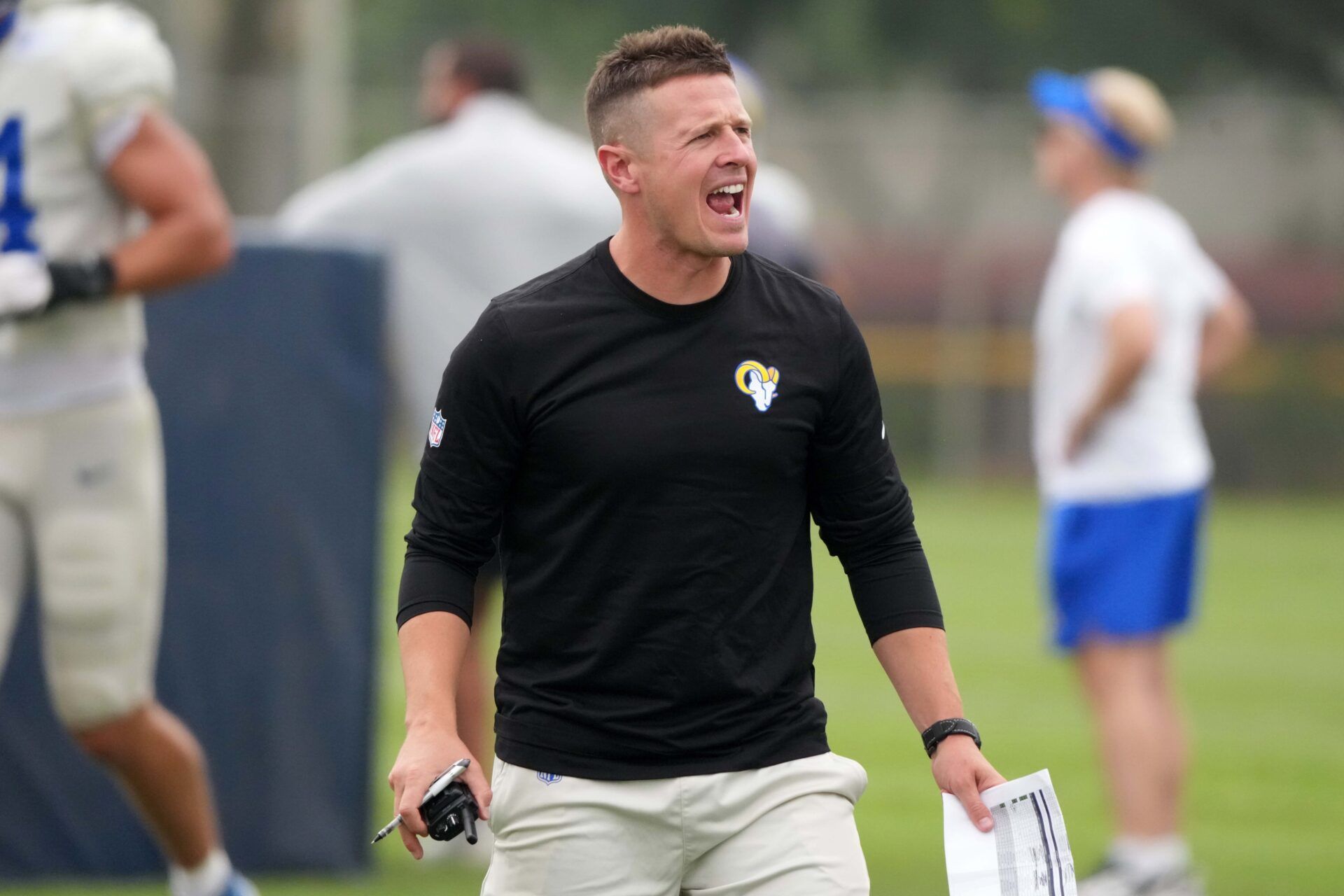 Los Angeles Rams offensive coordinator Mike LaFleur reacts during a joint practice at the Dignity Health Sports Park.