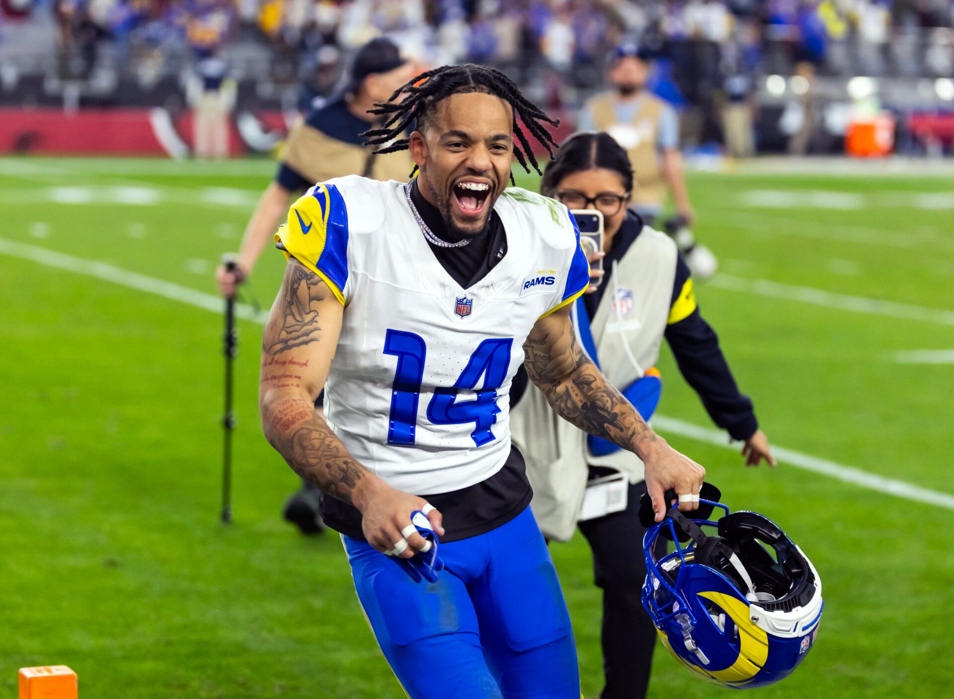 Los Angeles Rams cornerback Cobie Durant (14) celebrates after defeating the Arizona Cardinals at State Farm Stadium.