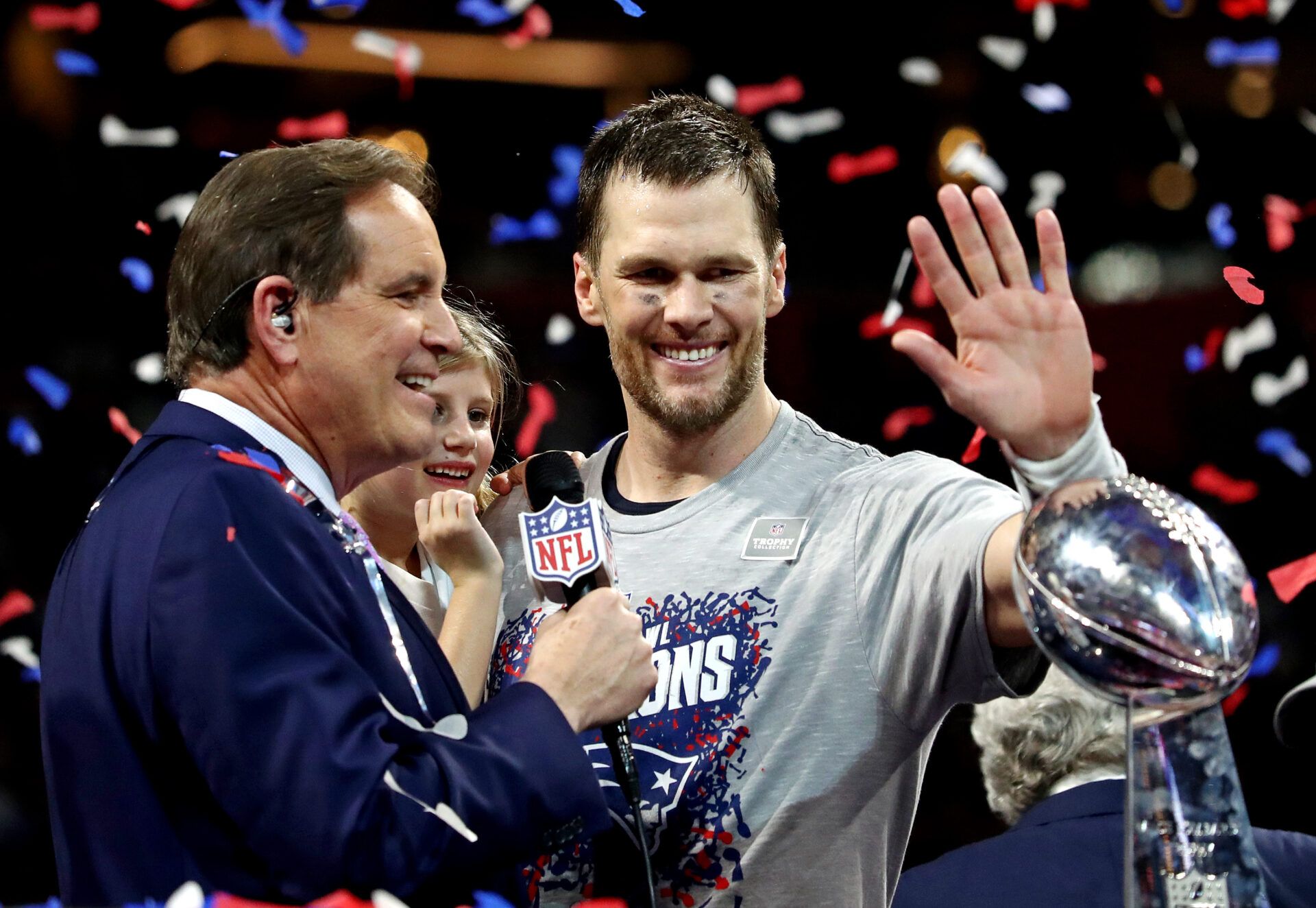 New England Patriots quarterback Tom Brady (12) celebrates with daughter Vivian after beating the Los Angeles Rams in Super Bowl LIII at Mercedes-Benz Stadium.