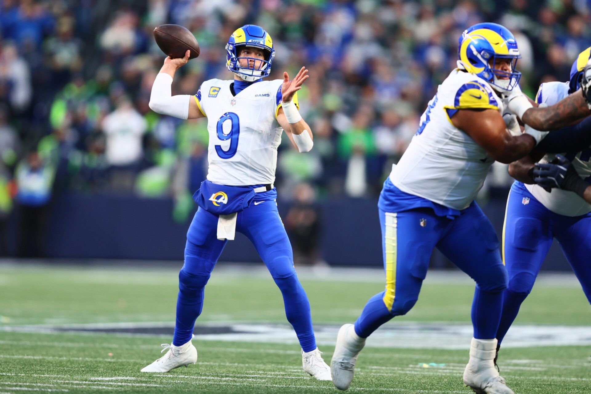 Los Angeles Rams quarterback Matthew Stafford (9) passes against the Seattle Seahawks during the first half in the 2026 NFC Championship Game at Lumen Field.