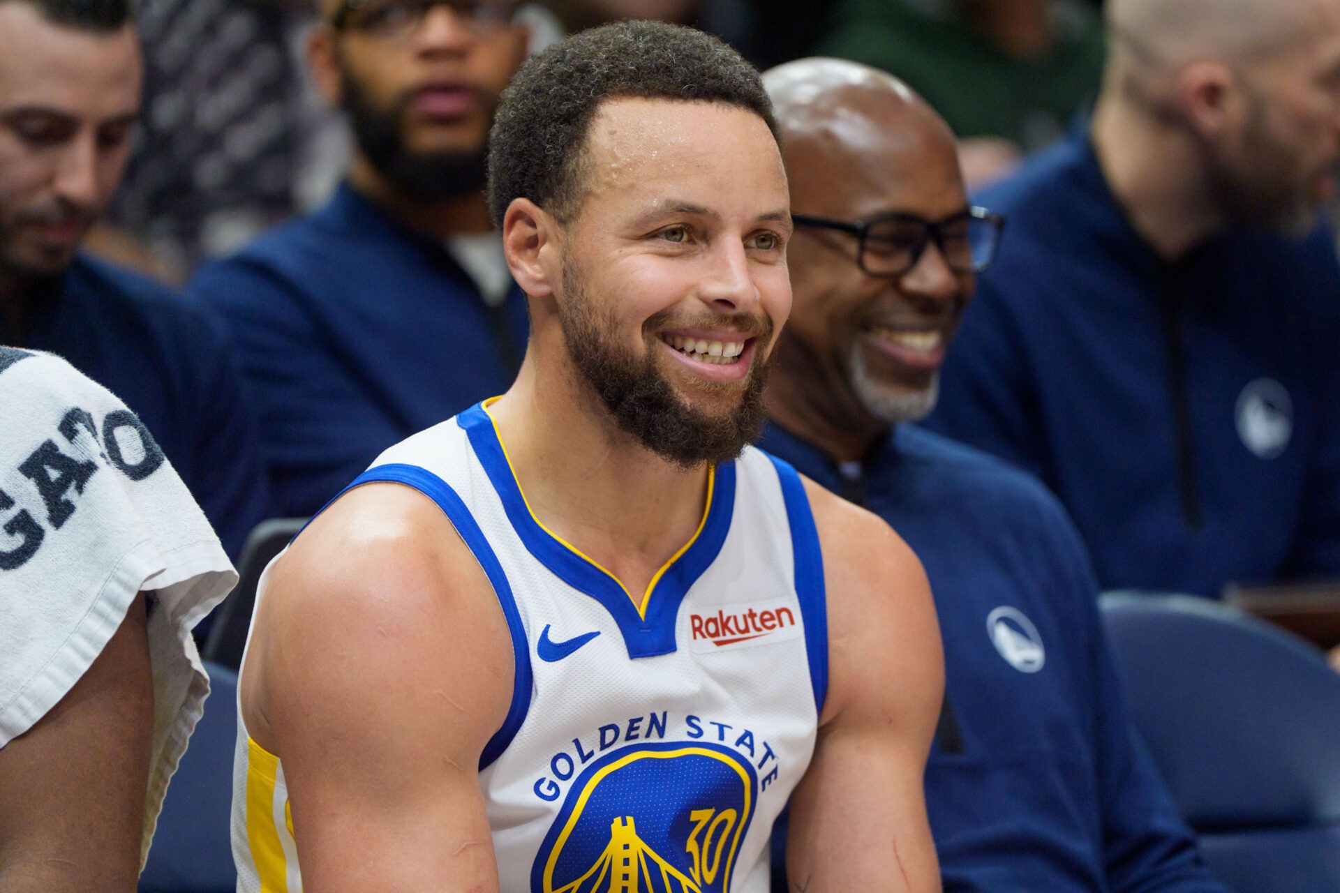 Golden State Warriors guard Stephen Curry (30) smiles after exiting the game against the Minnesota Timberwolves in the fourth quarter at Target Center.