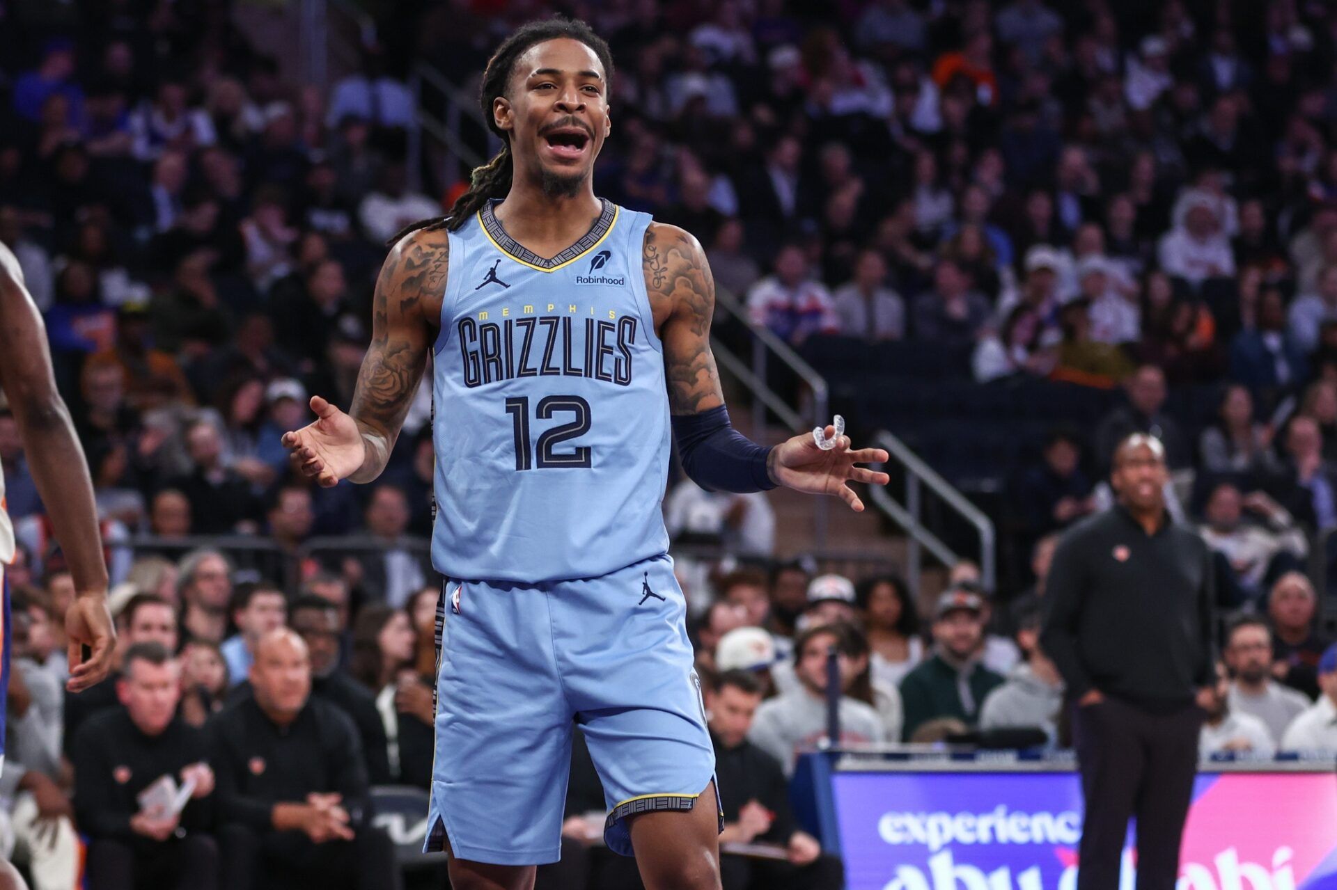 Memphis Grizzlies guard Ja Morant (12) reacts after getting called for a foul in the second quarter against the New York Knicks at Madison Square Garden.