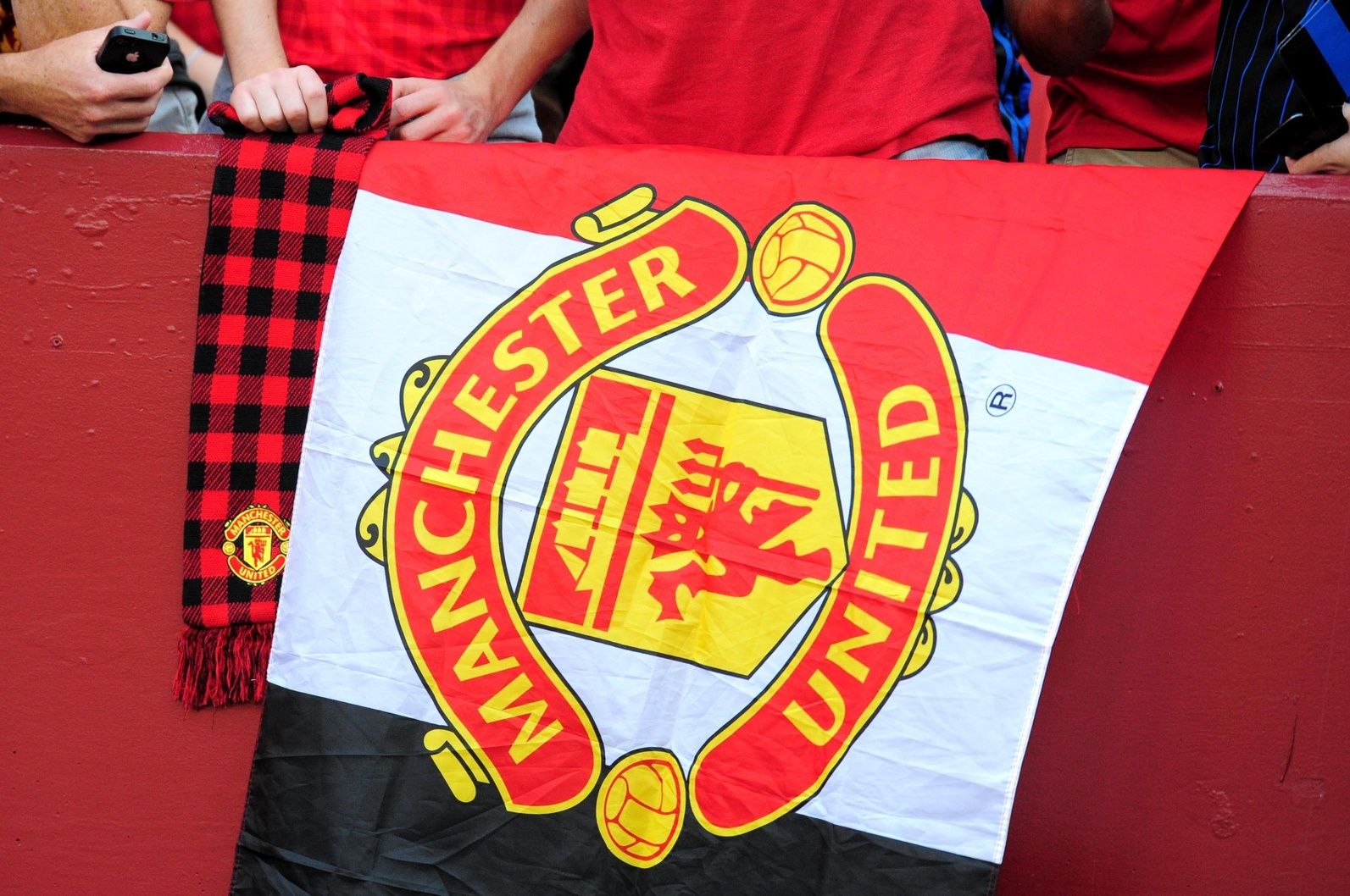 Fans hang a flag prior to the match between Inter Milan and Manchester United at FedEx Field.