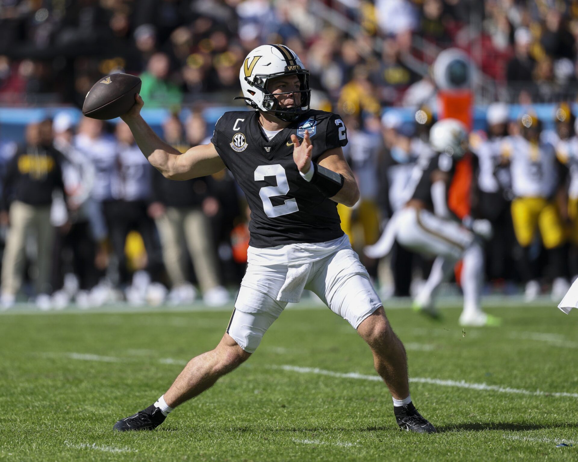 Vanderbilt Commodores quarterback Diego Pavia (2) throws a pass against the Iowa Hawkeyes in the first quarter during the ReliaQuest Bowl at Raymond James Stadium.