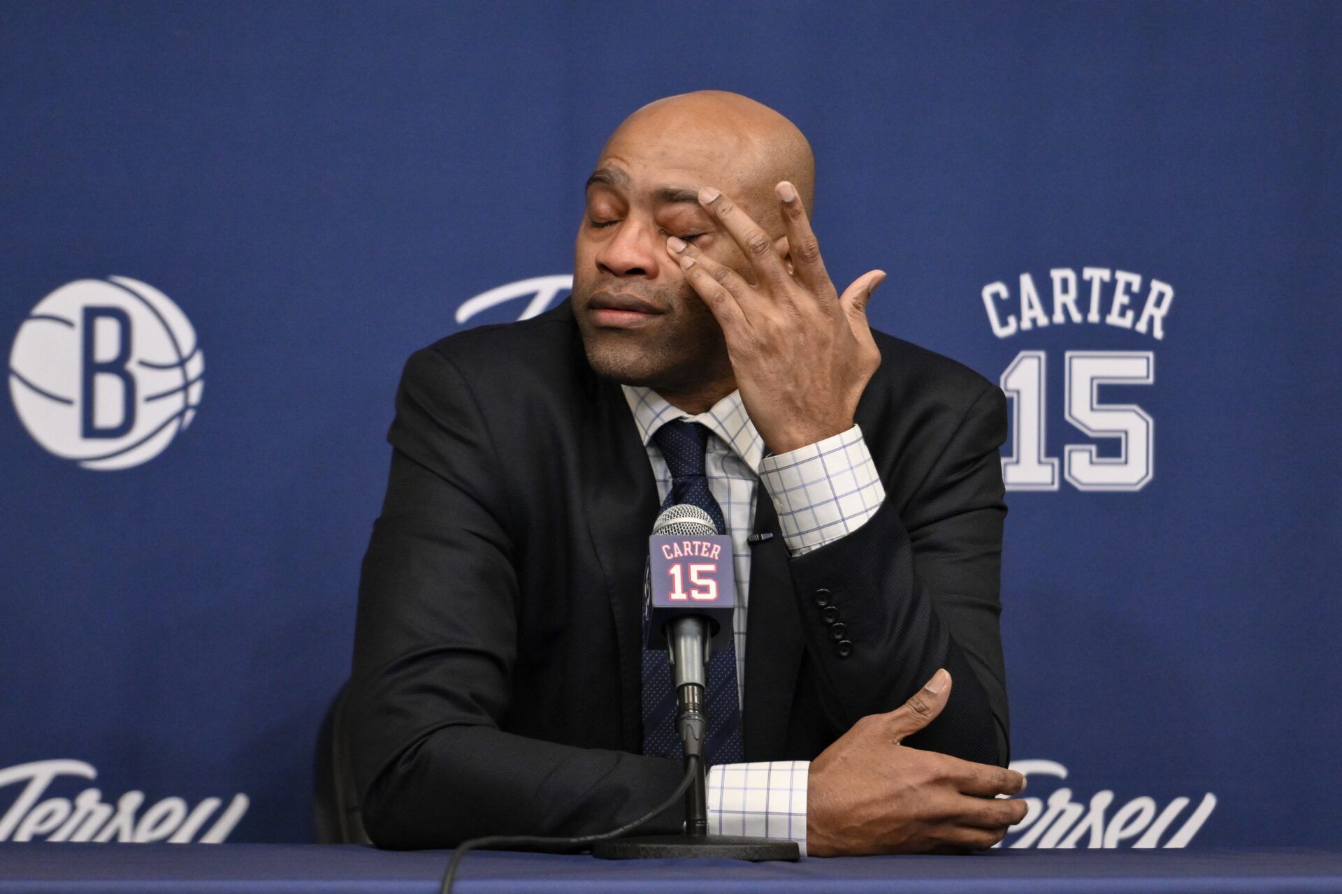 Former NBA star Vince Carter speaks at a jersey retirement press conference before a game between the Brooklyn Nets and the Miami Heat at Barclays Center.