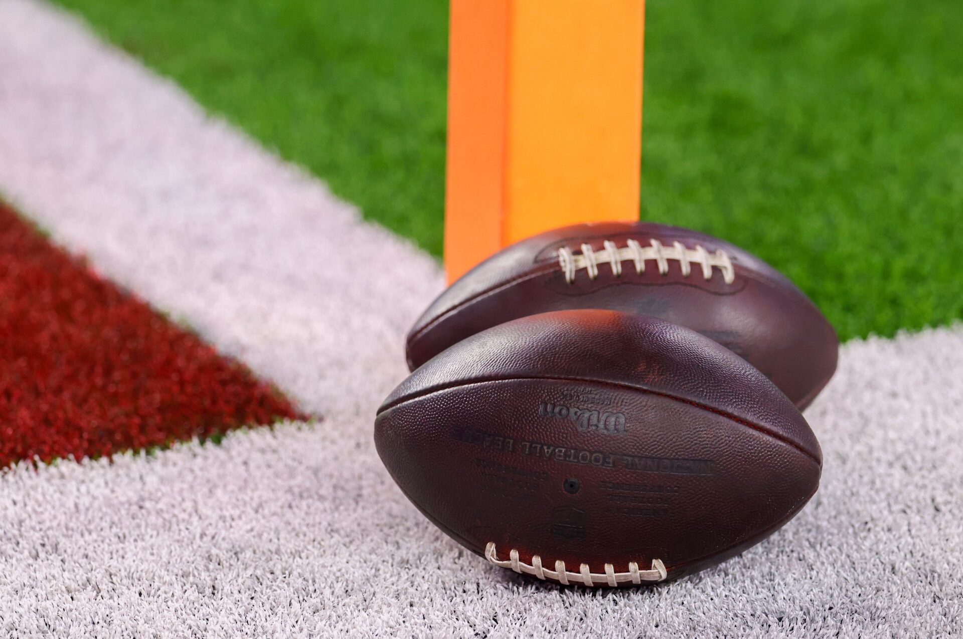 NFL football lies near the end zone pylon before playing against the Buffalo Bills at NRG Stadium.