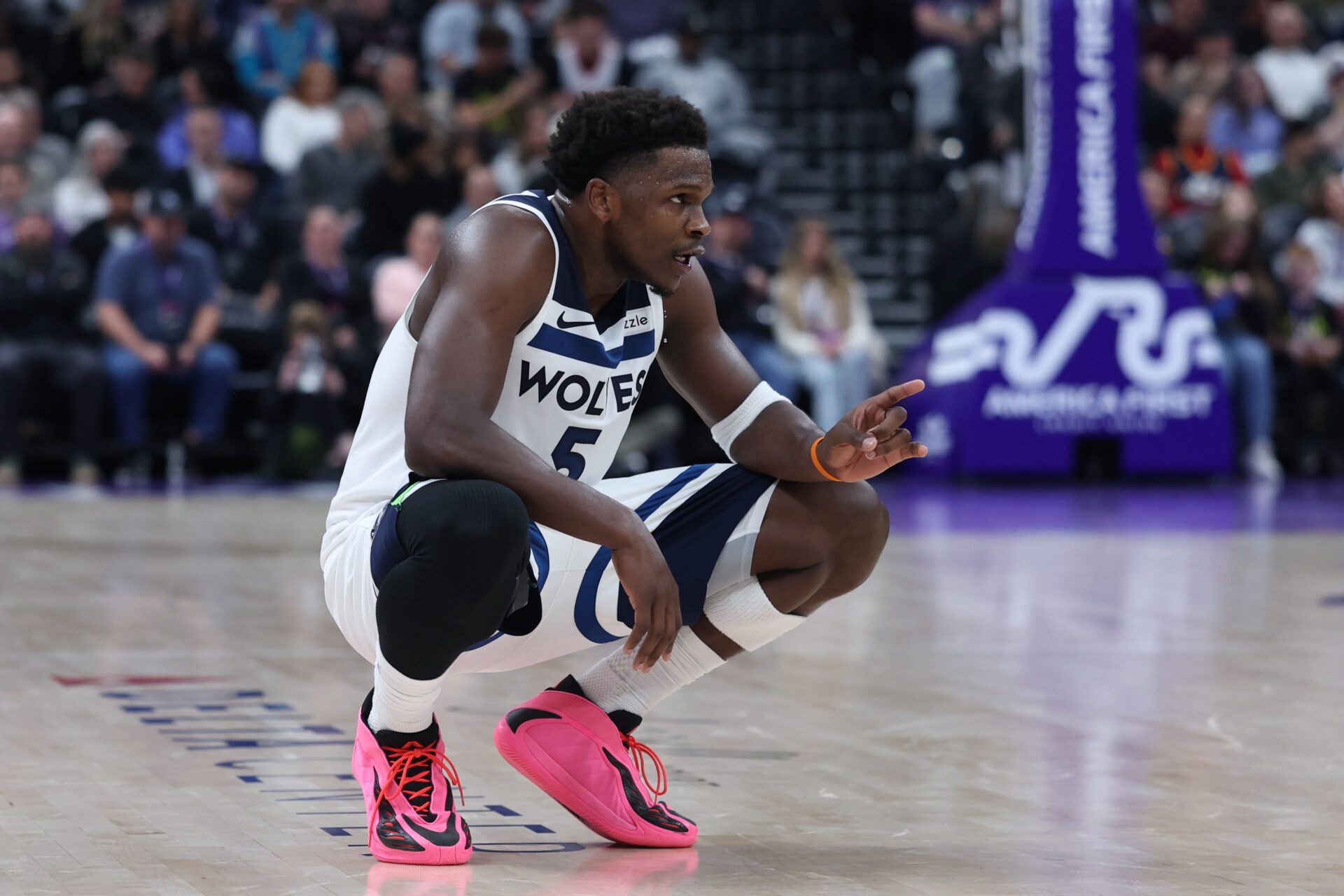 Minnesota Timberwolves guard Anthony Edwards (5) reacts during a break in action against the Utah Jazz during the second half at Delta Center.