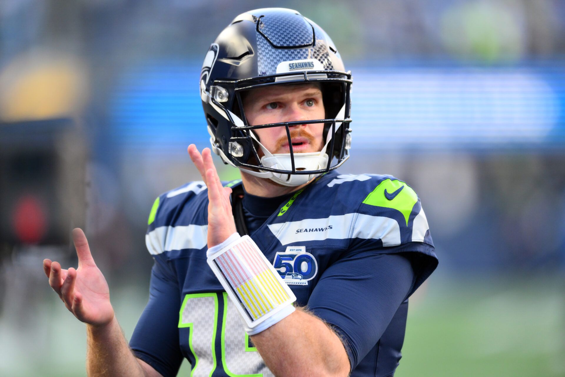 Seattle Seahawks quarterback Sam Darnold (14) looks on before the 2026 NFC Championship Game against the Los Angeles Rams at Lumen Field.