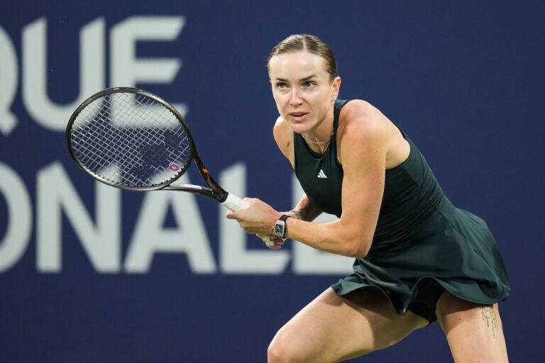 Elina Svitolina (UKR) tracks her shot against Naomi Osaka (JPN) in quarterfinal play at IGA Stadium.