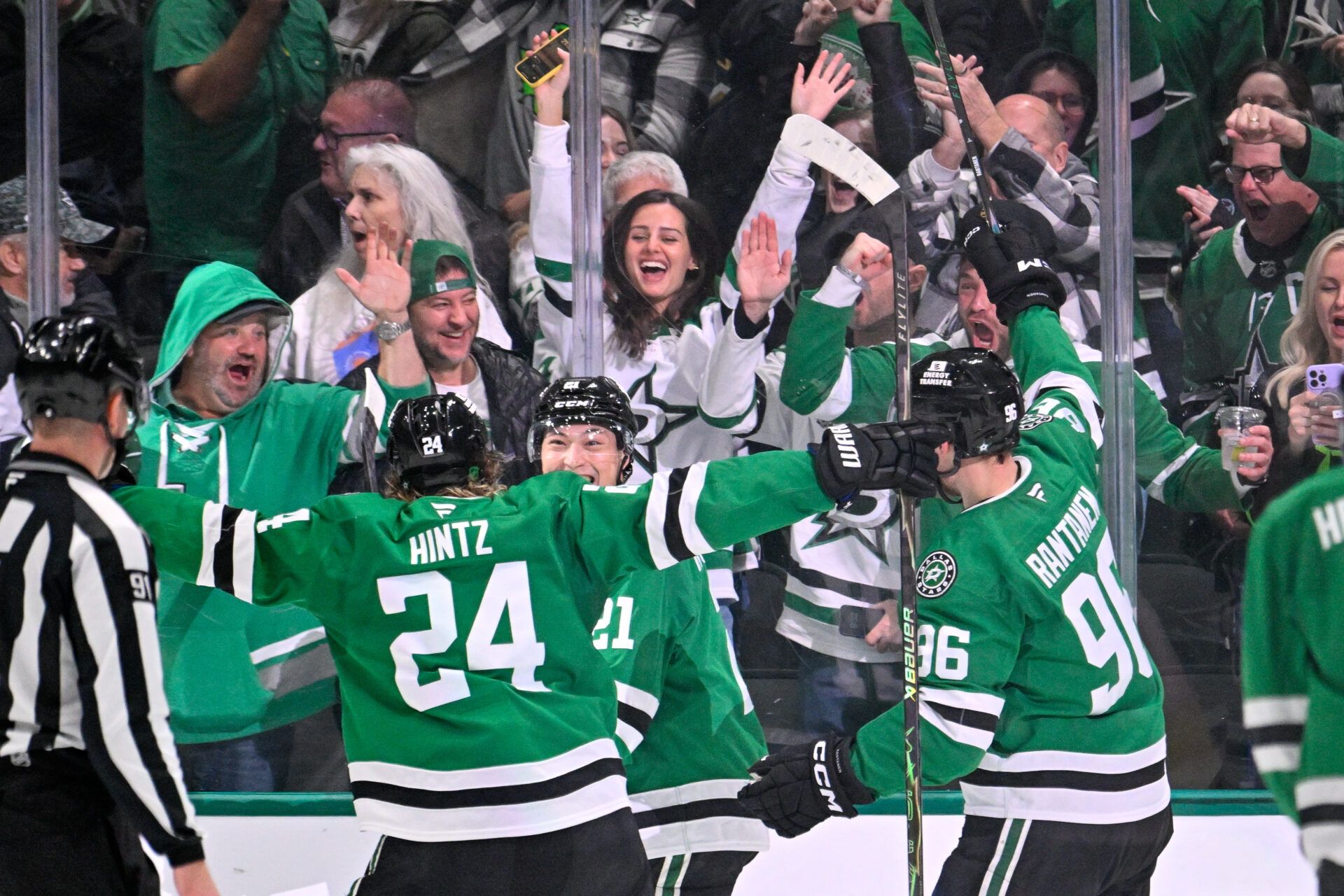 Dallas Stars center Roope Hintz (24) and left wing Jason Robertson (21) and right wing Mikko Rantanen (96) celebrate the game winning goal scored by Robertson against the St. Louis Blues during the third period at the American Airlines Center.