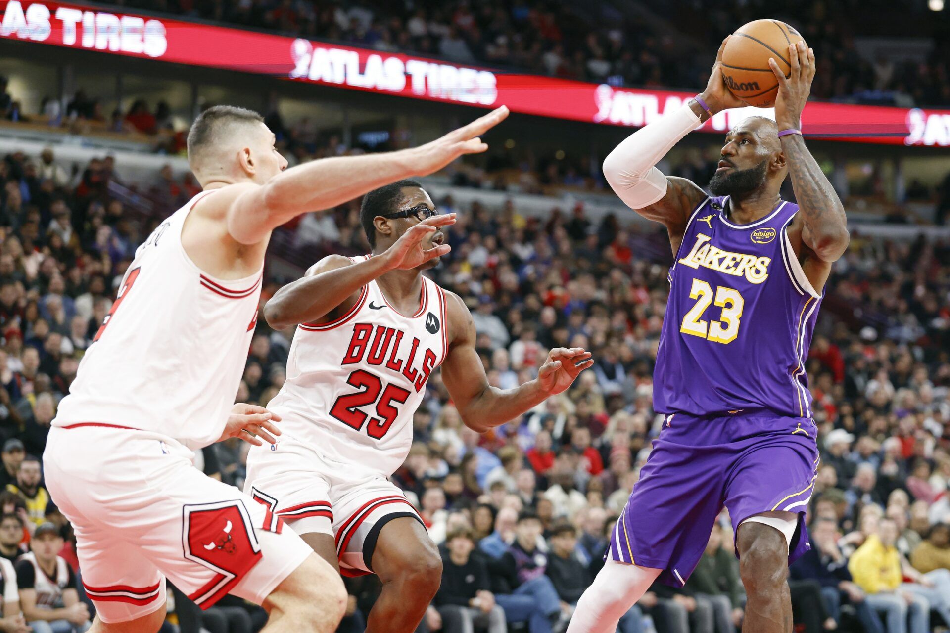 Los Angeles Lakers forward LeBron James (23) shoots against the Chicago Bulls during the second half at United Center.