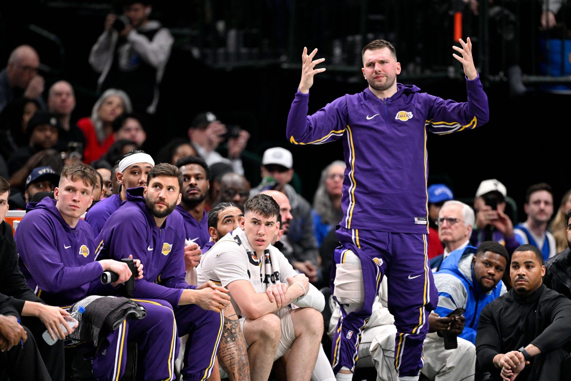 Los Angeles Lakers guard Luka Doncic (77) reacts from the team bench during the second quarter against the Dallas Mavericks at the American Airlines Center.