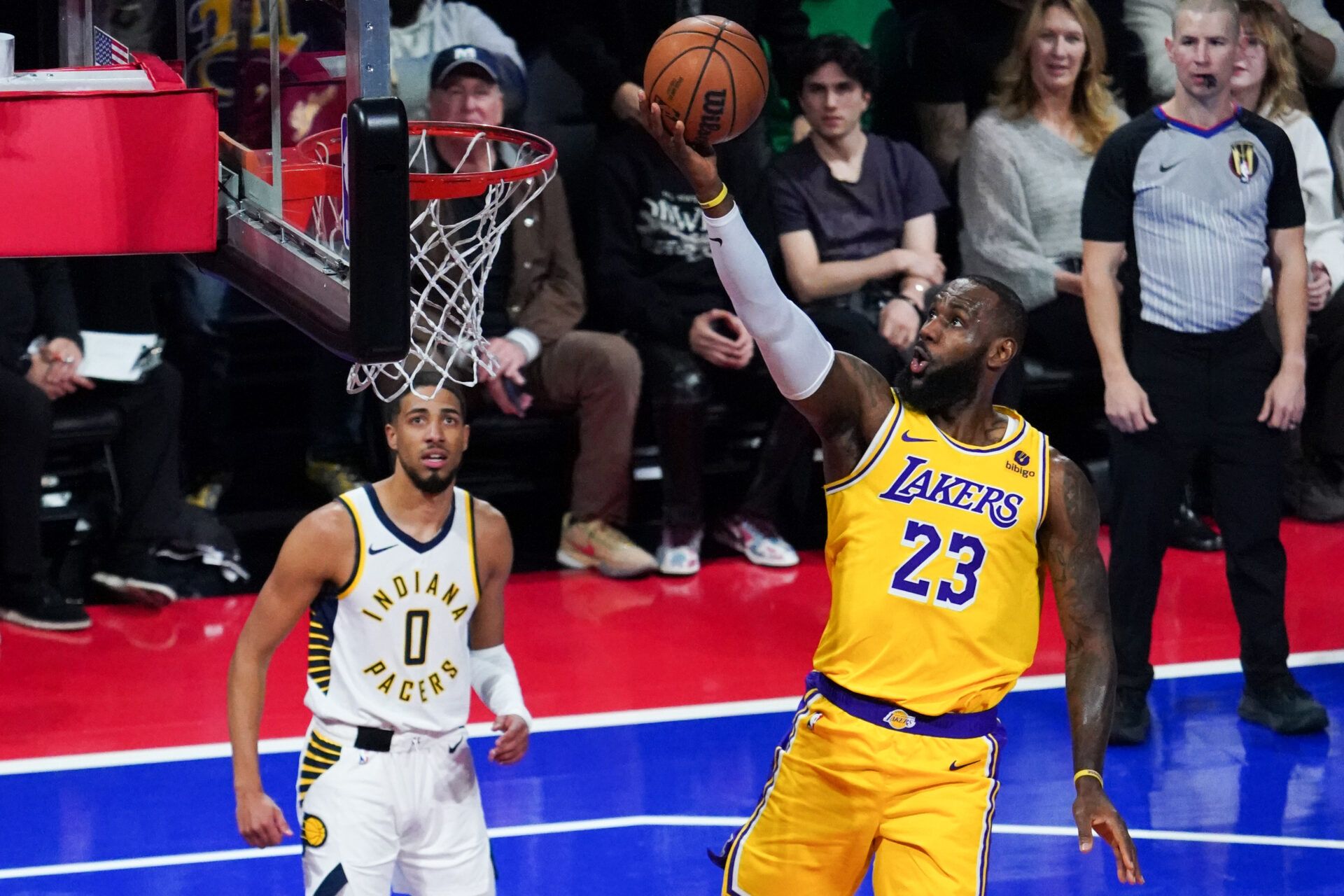 Los Angeles Lakers forward LeBron James (23) shoots the basketball against Indiana Pacers guard Tyrese Haliburton (0) during the first quarter of the in-season tournament championship at T-Mobile Arena.