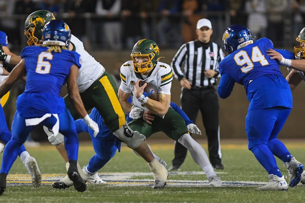 North Dakota State Bison quarterback Cole Payton (9) searches for an opening to pass the ball during a game against the South Dakota State Jackrabbits on Saturday, Oct. 25, 2025. at Dana J. Dykhouse Stadium in Brookings, South Dakota.