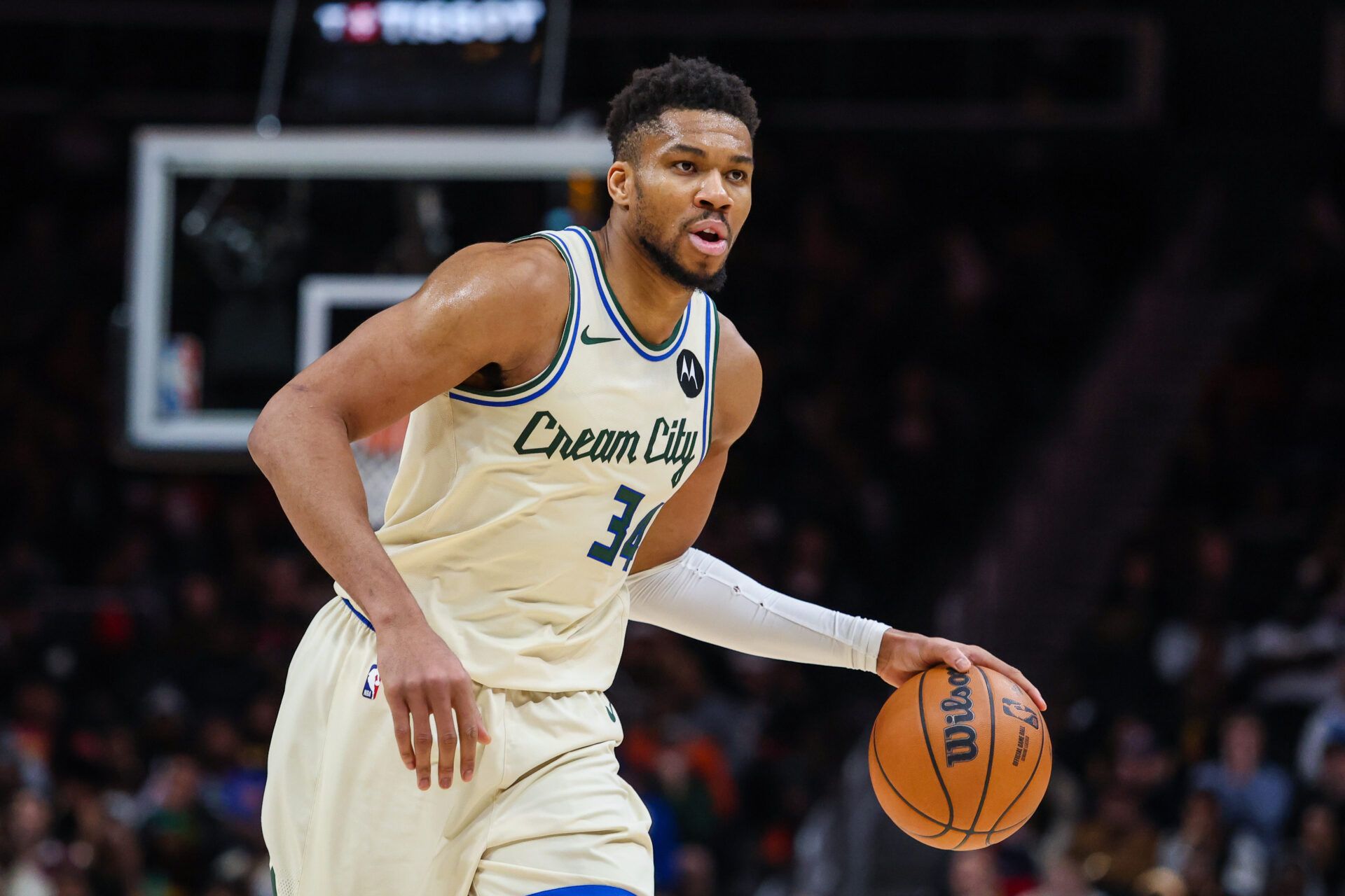 Milwaukee Bucks forward Giannis Antetokounmpo (34) dribbles the ball down the court against the Atlanta Hawks during the fourth quarter at State Farm Arena.