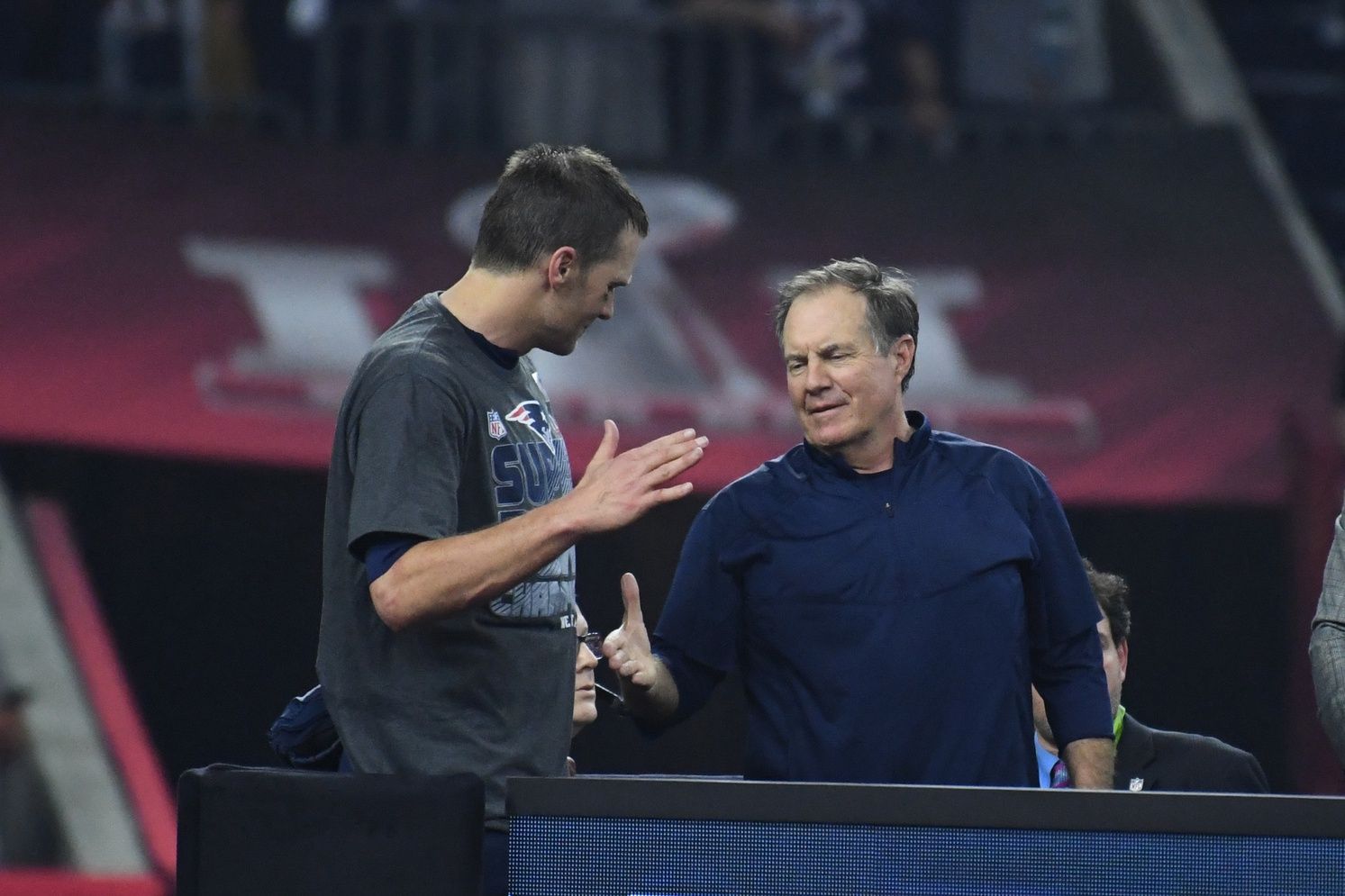 New England Patriots quarterback Tom Brady (12) and New England Patriots head coach Bill Belichick celebrate after Super Bowl LI at NRG Stadium.
