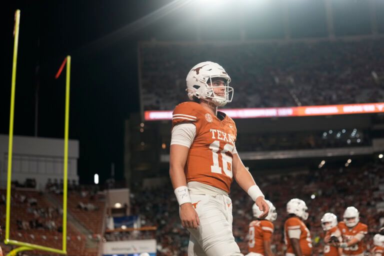 Texas Longhorns quarterback Arch Manning warms up before a game against the Texas A&M Aggies at Darrell K Royal-Texas Memorial Stadium.