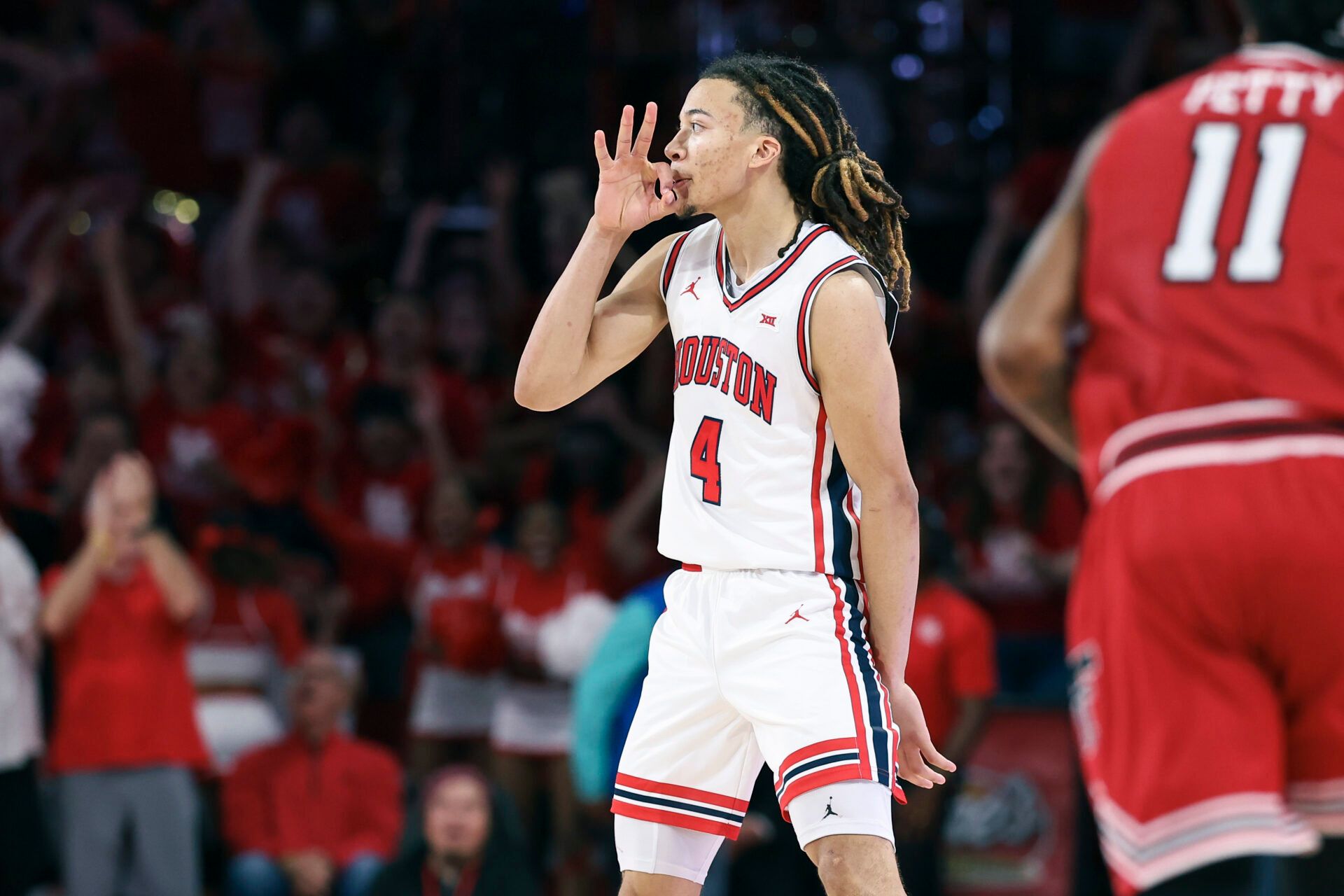 Houston Cougars guard Kingston Flemings (4) reacts after making a three-point basket during the second half against the Texas Tech Red Raiders at Fertitta Center.