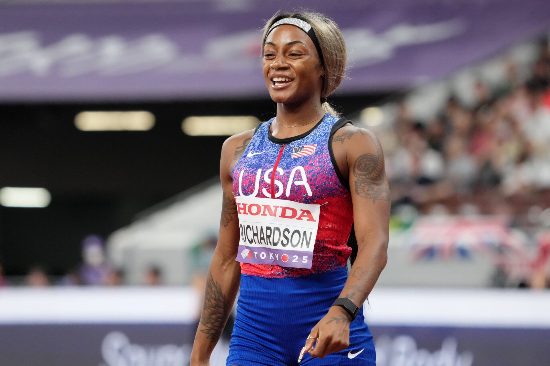Sha'Carri Richardson (USA) reacts after competing in a womens 4x100m relay heat at National Stadium.
